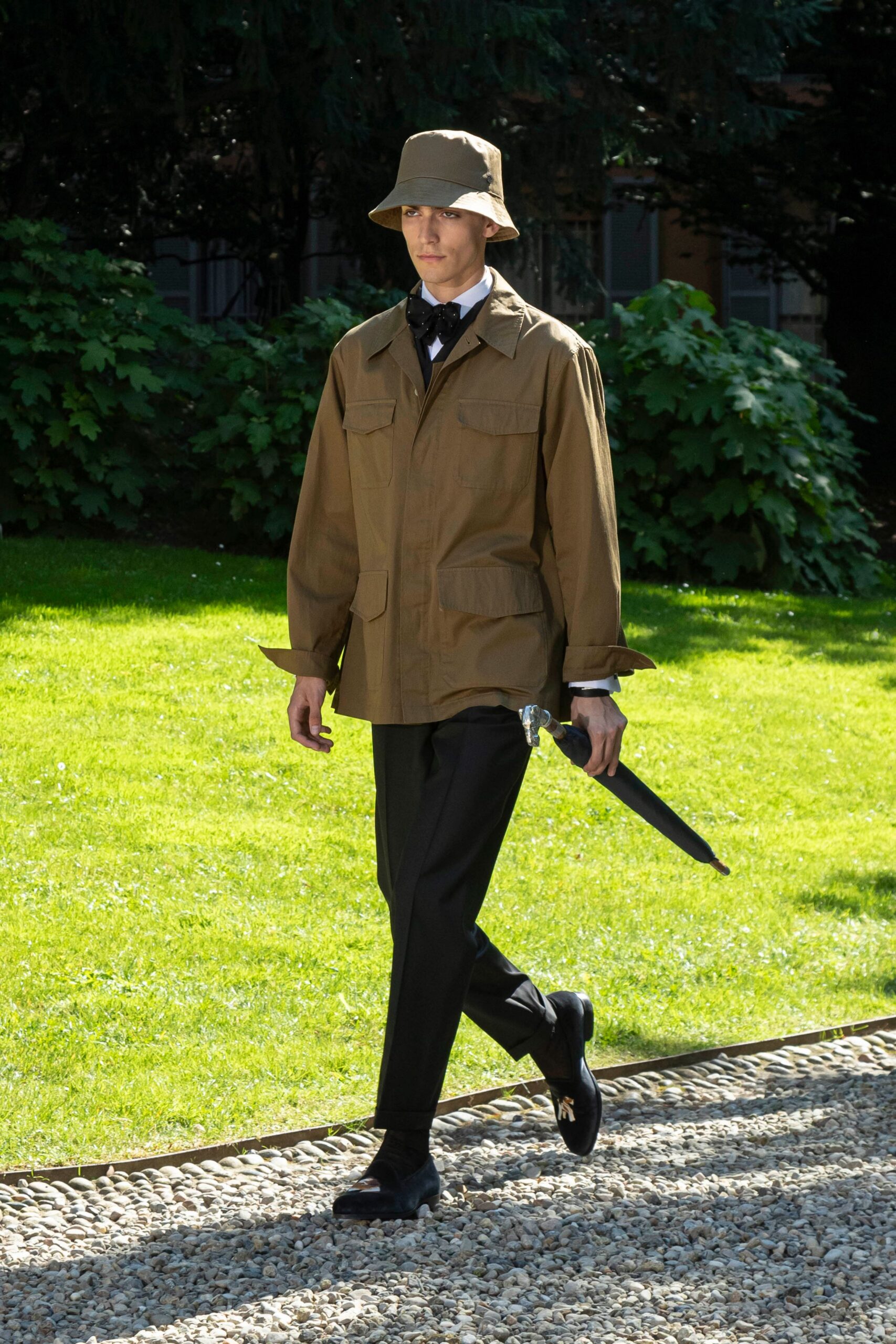 brown relaxed jacket with black pants