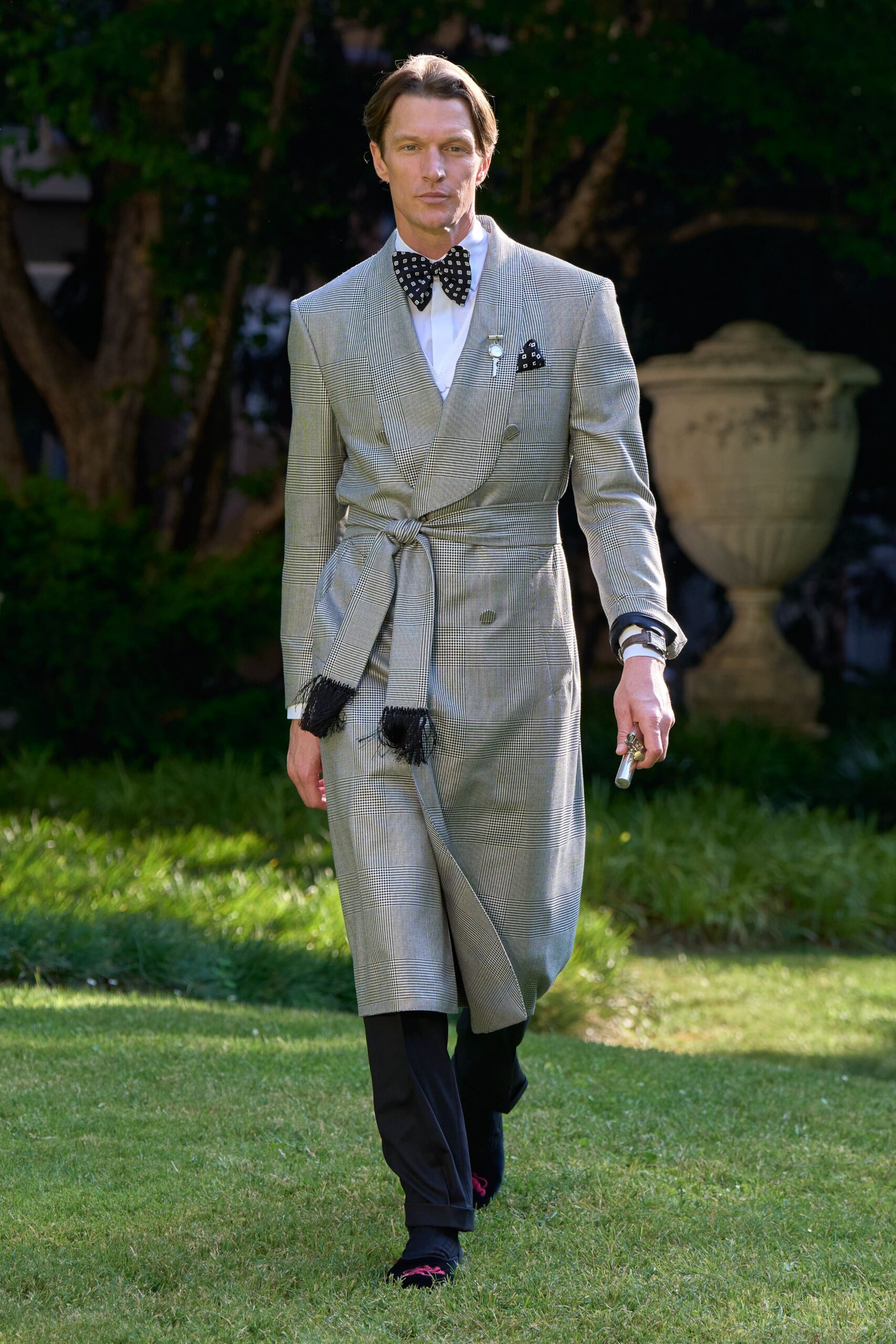 gray tailored coat with bowtie