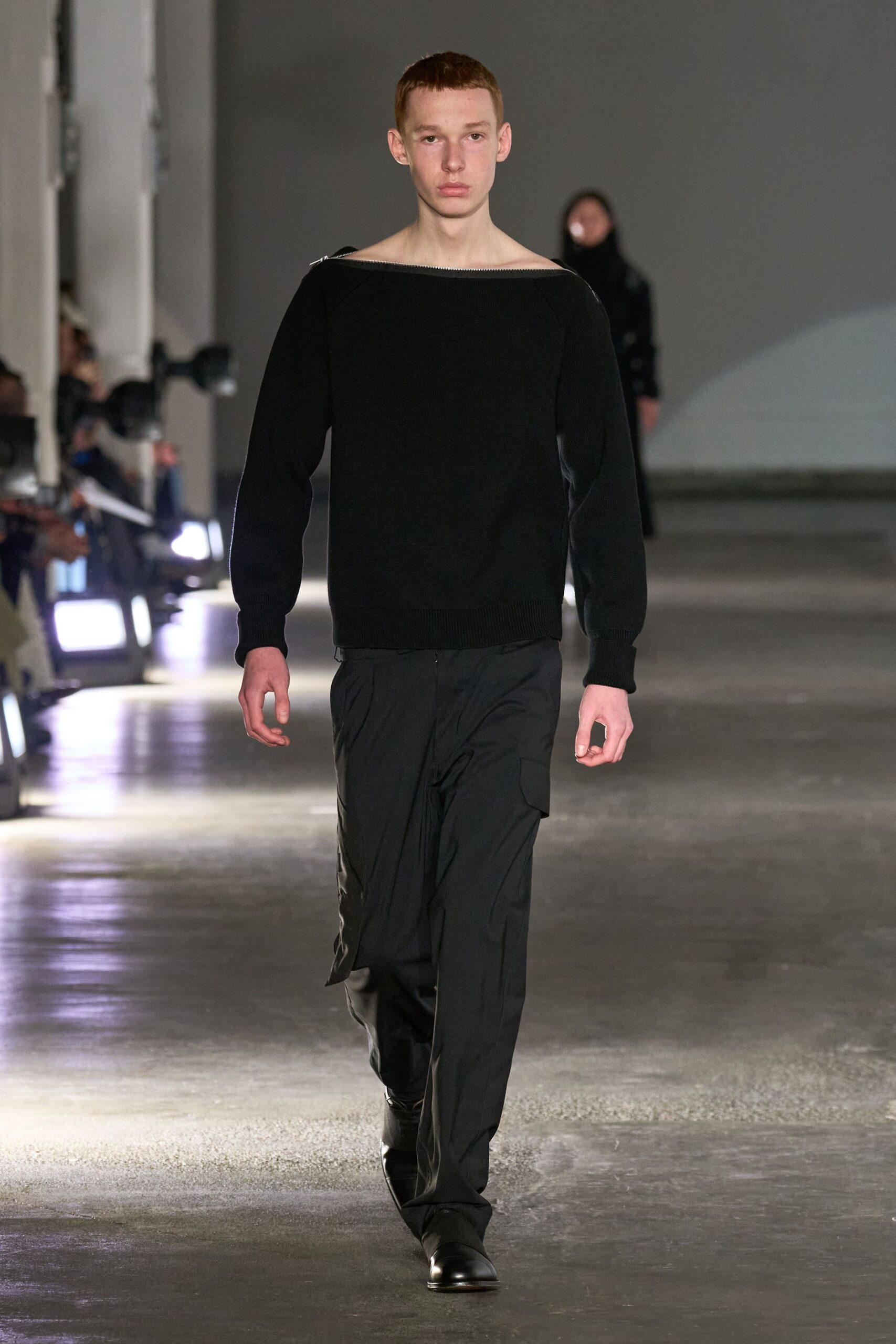 black relaxed sweater with cargo pants