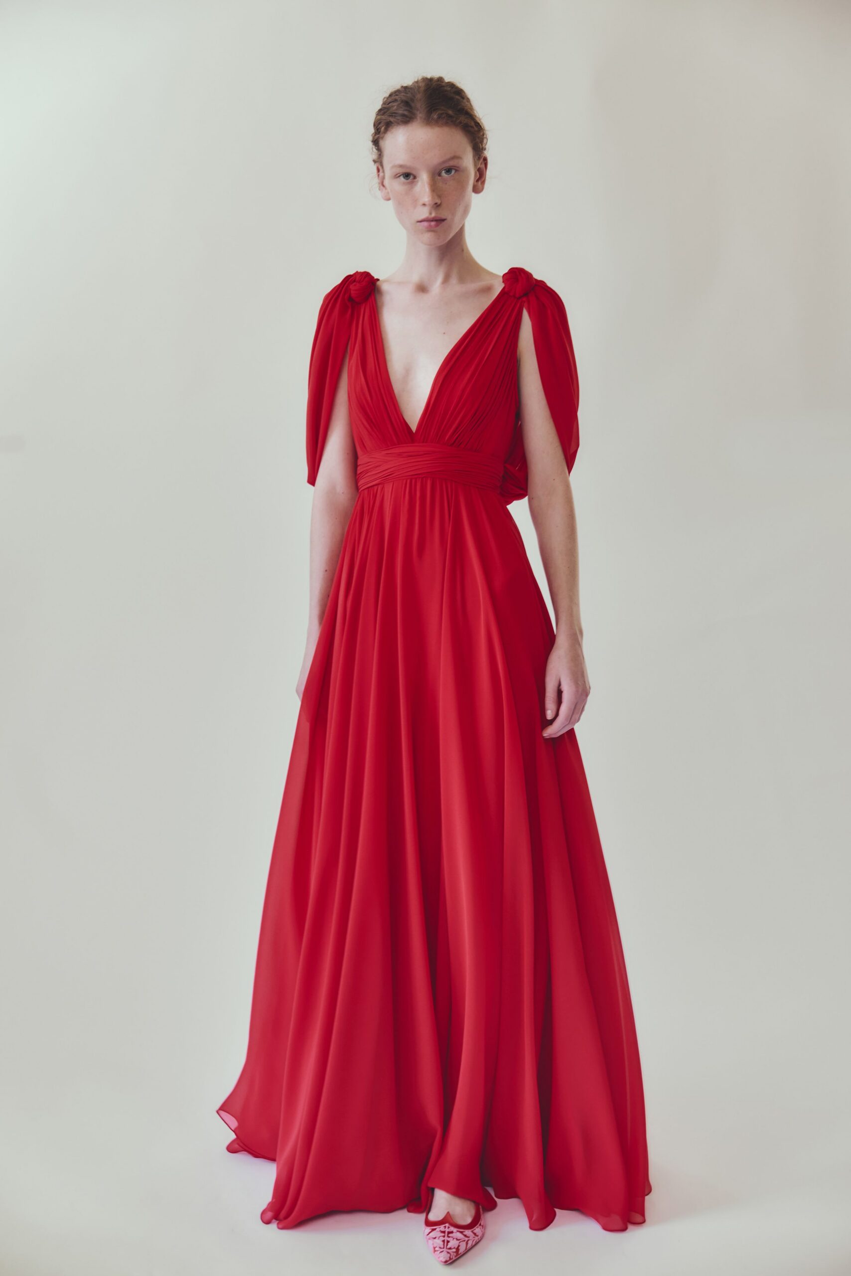 red chiffon gown with pink shoes