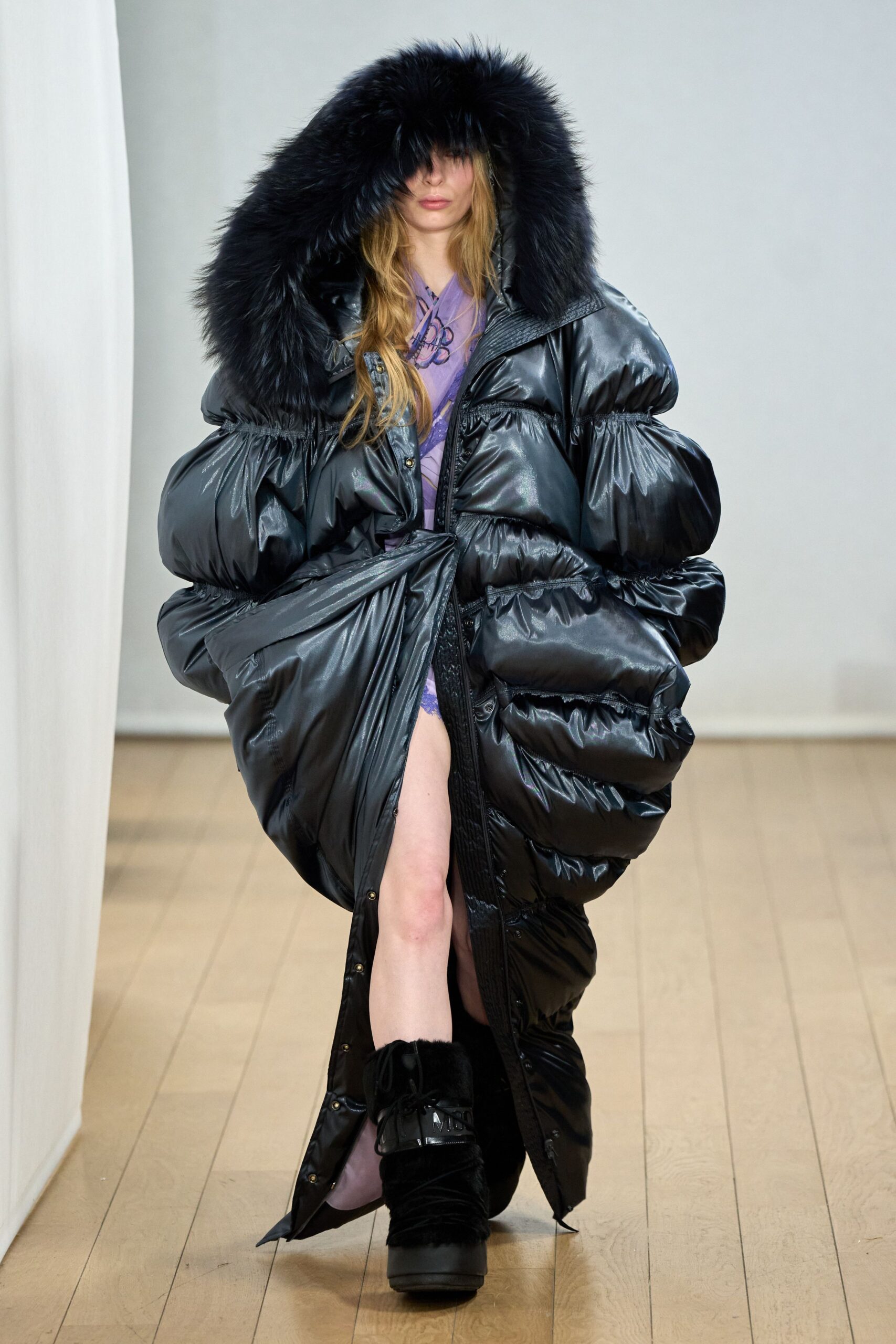black vinyl hooded coat