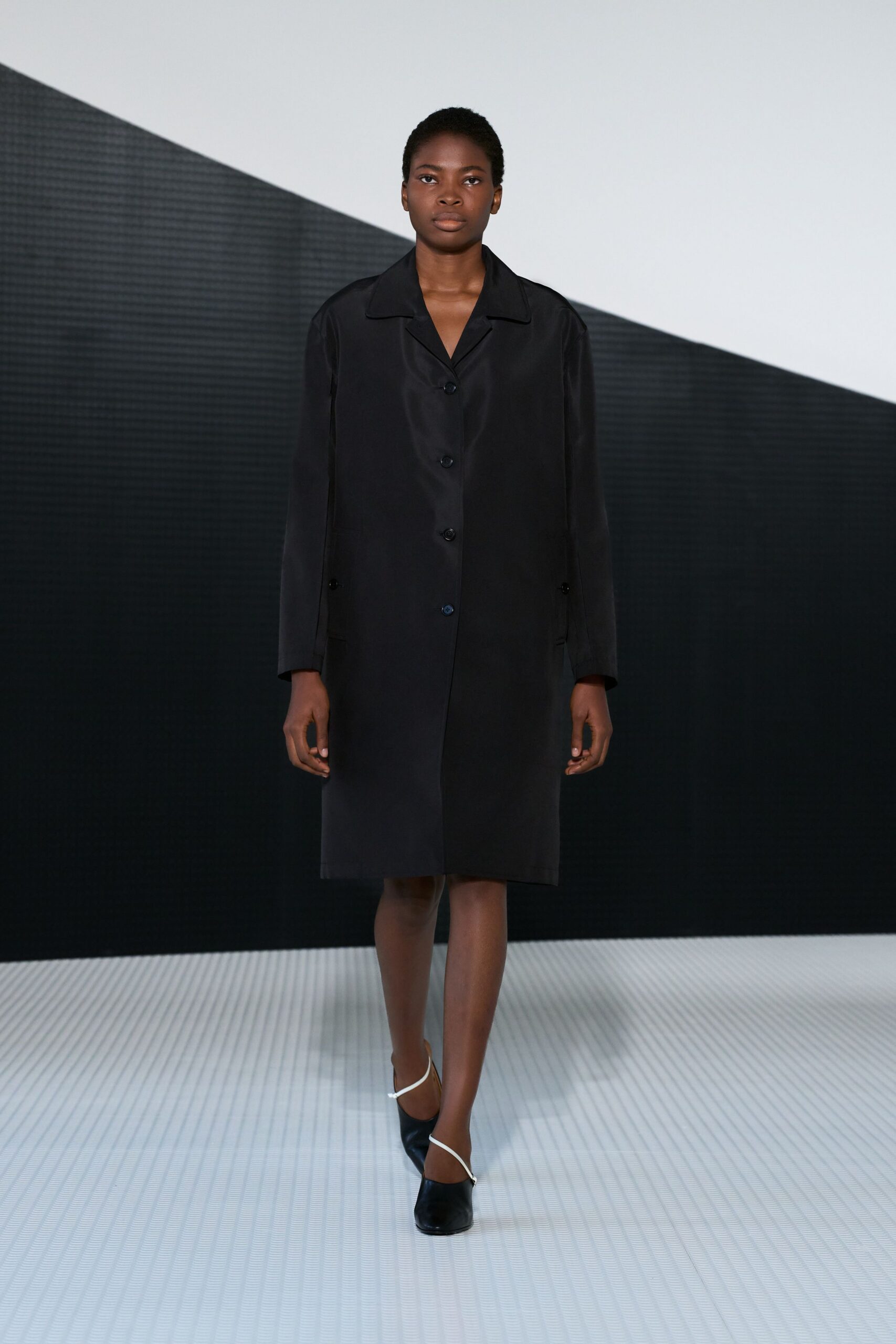 black silk long-sleeve collared relaxed buttoned coat