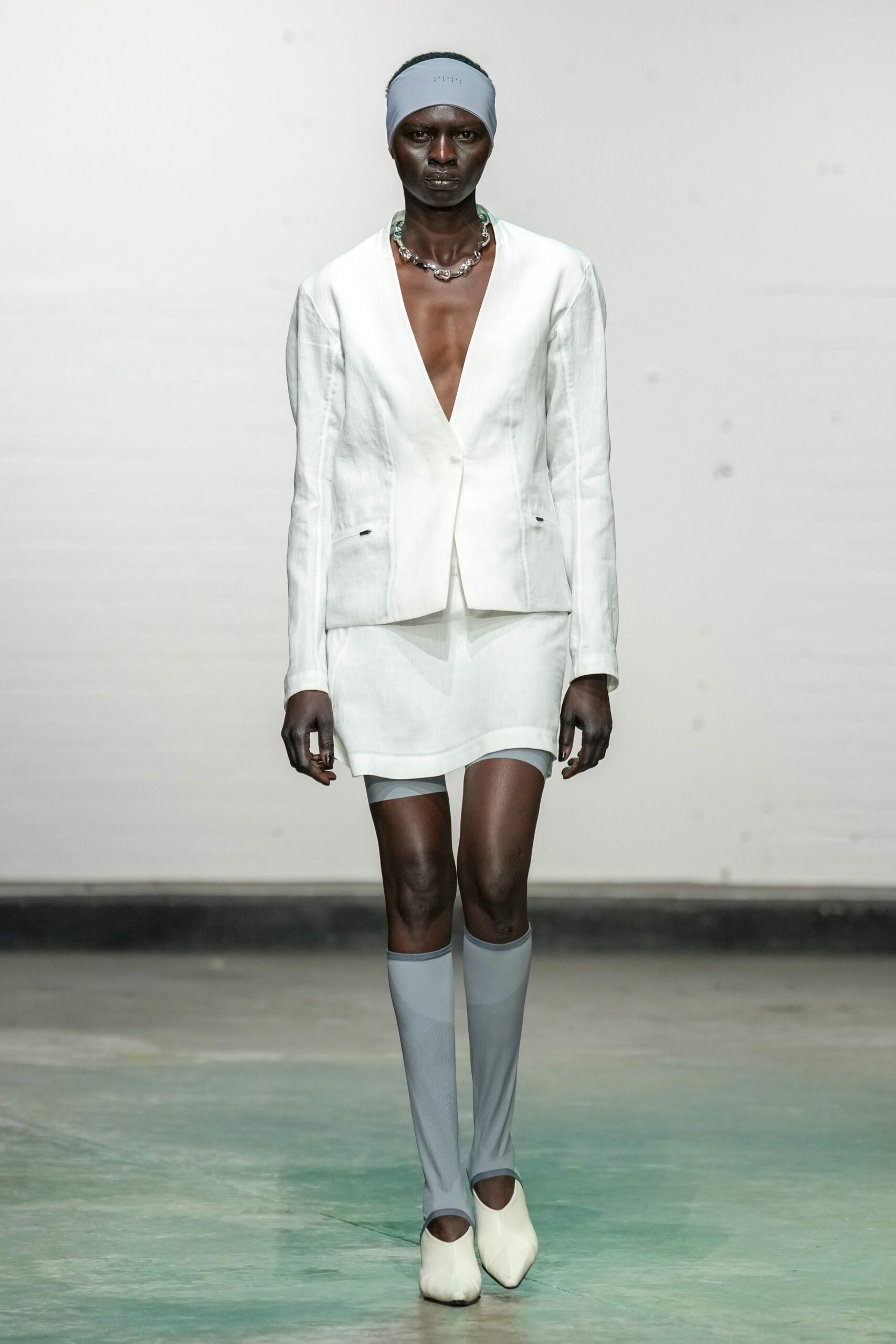 white cotton long-sleeve v-neck fitted blazer
