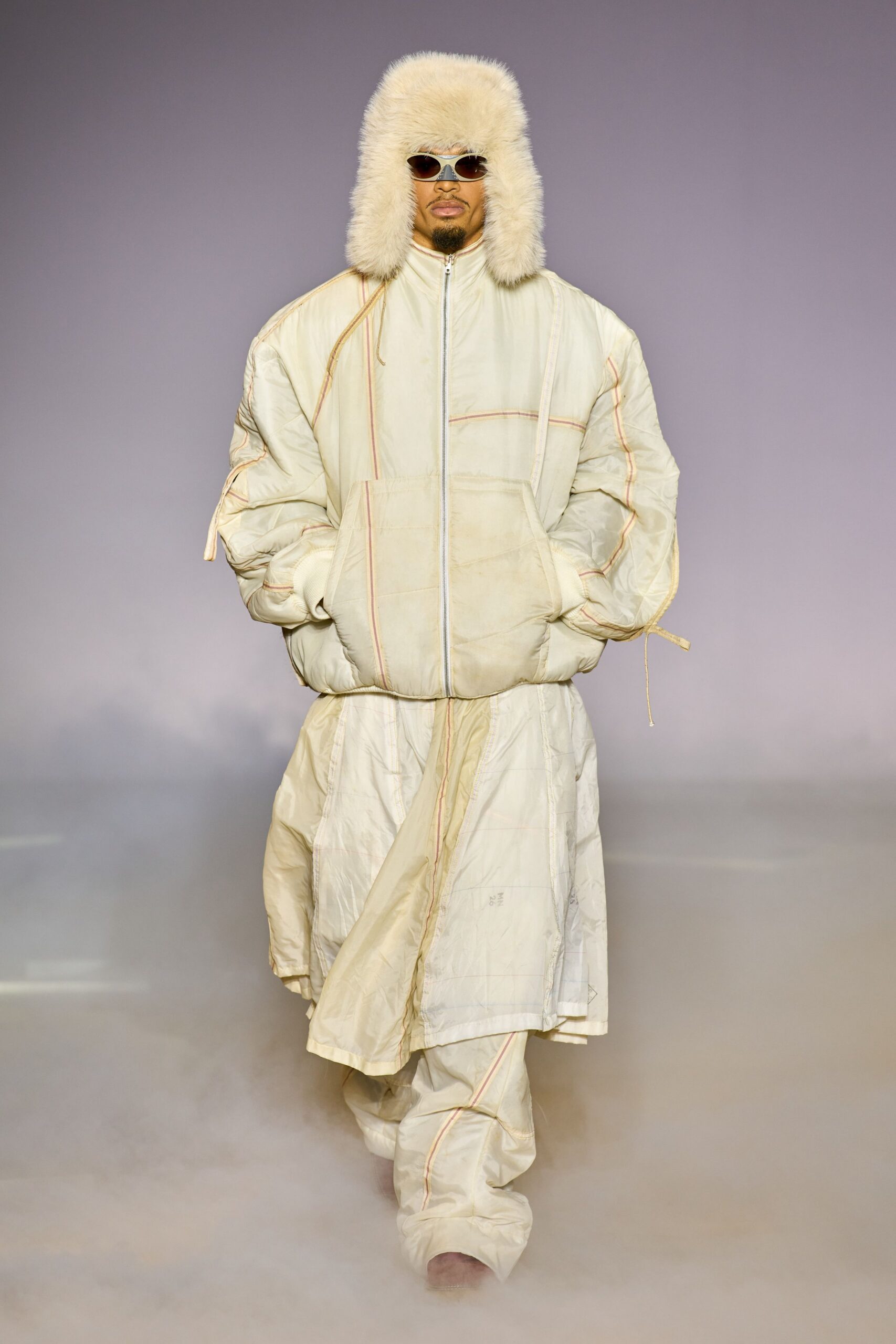 white oversized coat with fur hat