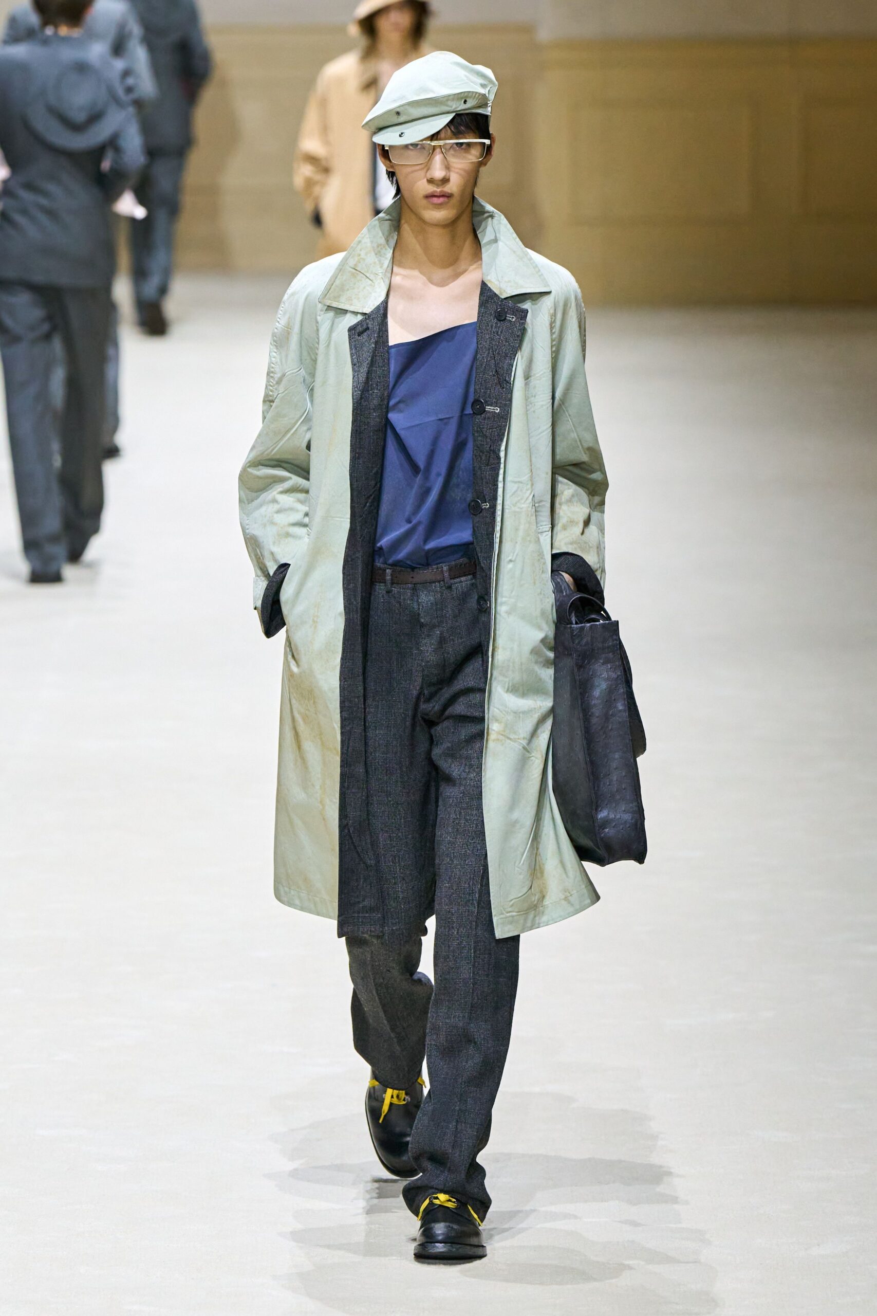 light green coat with blue top