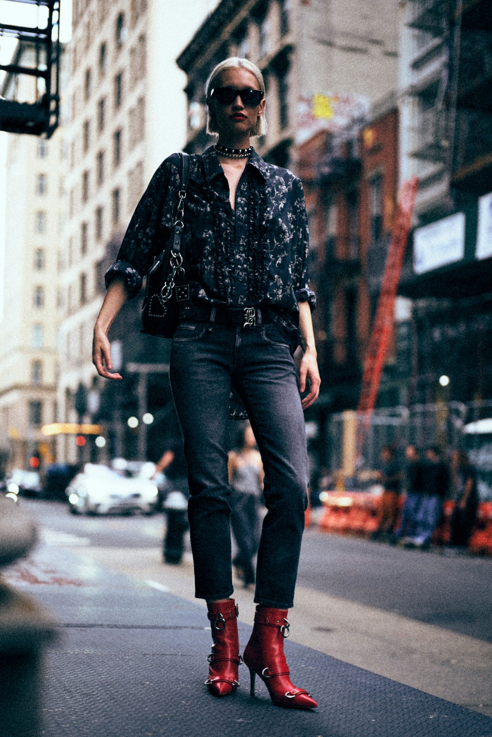 black printed shirt with gray pants