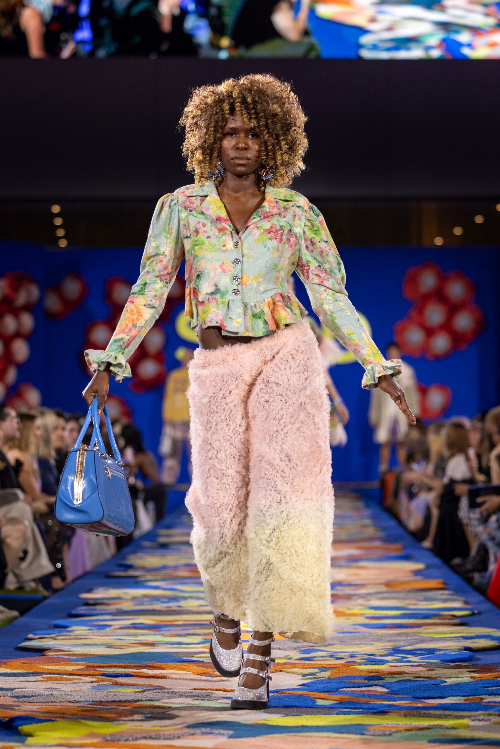 floral top with faux-fur pants