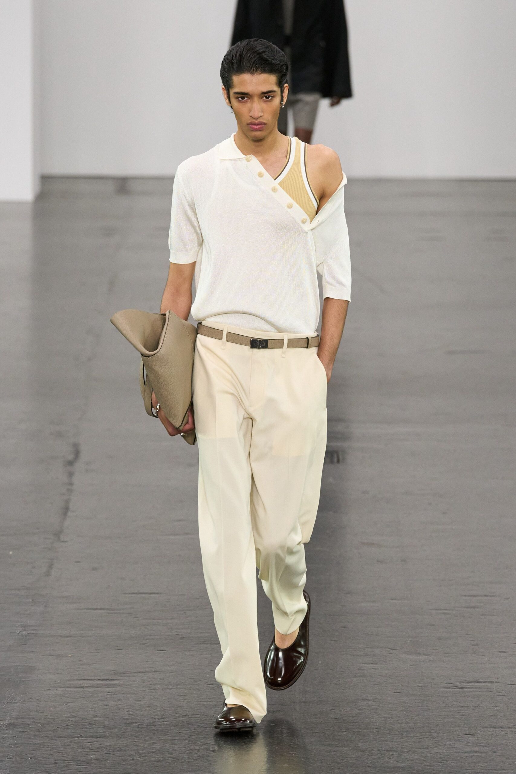 white relaxed shirt with beige pants