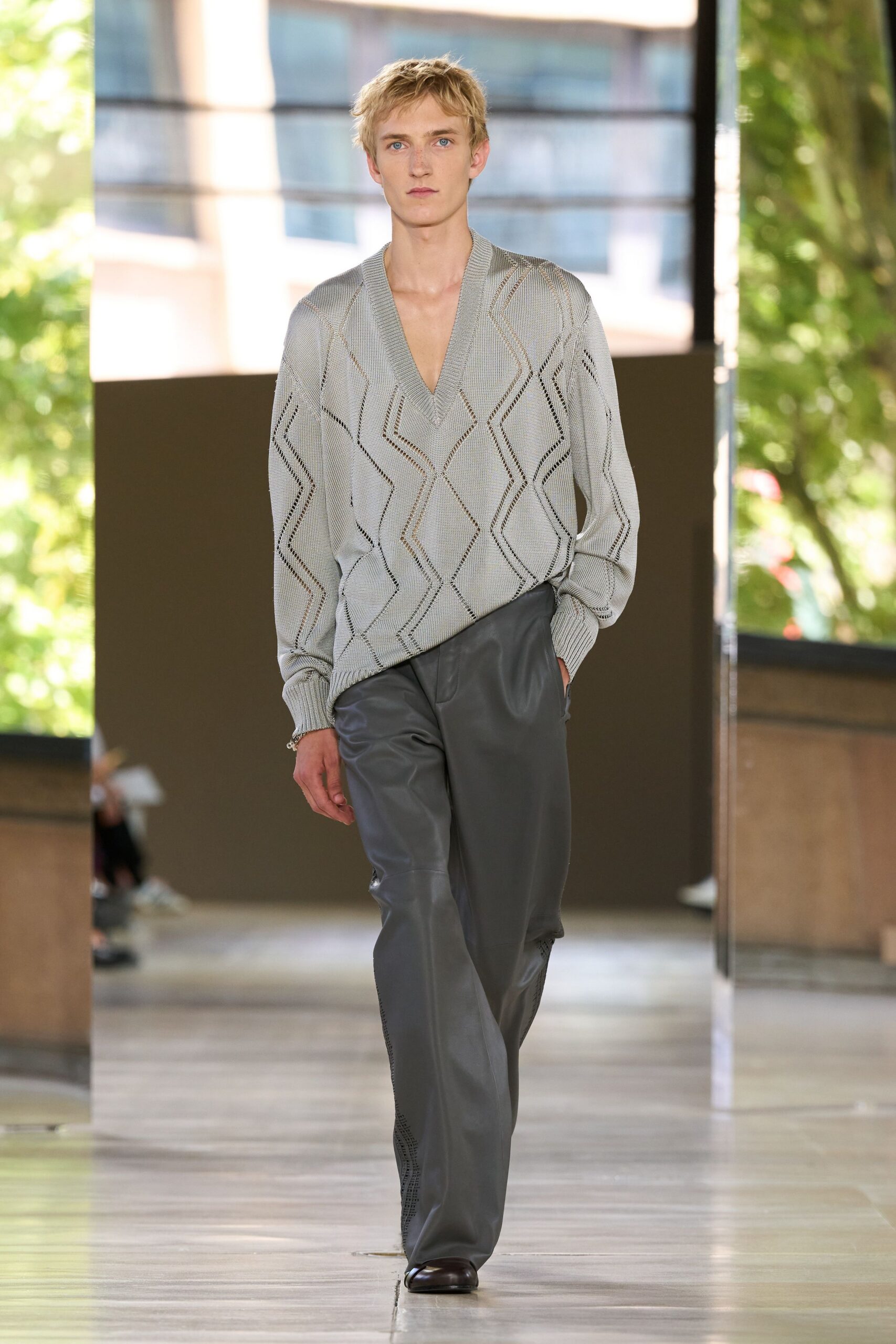gray relaxed sweater with black pants