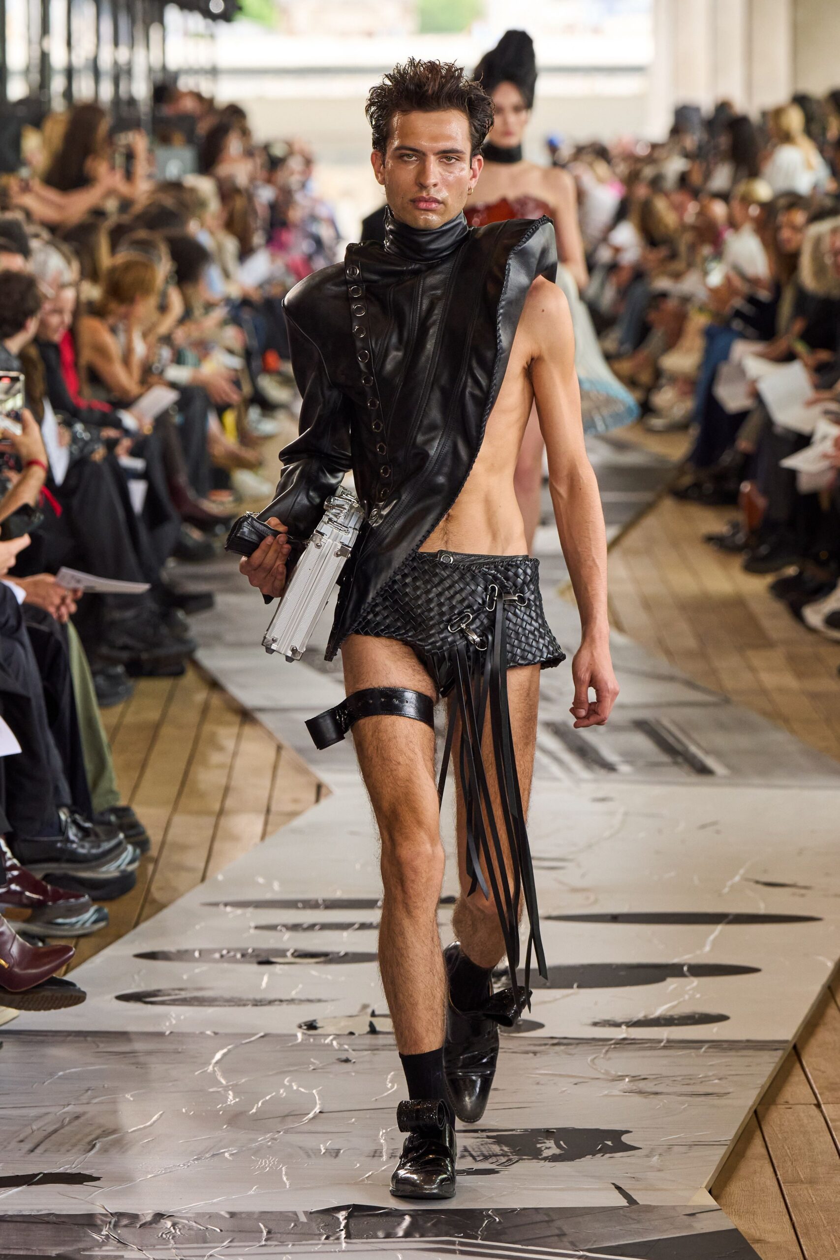 black leather sleeveless high-neck fitted zippered top