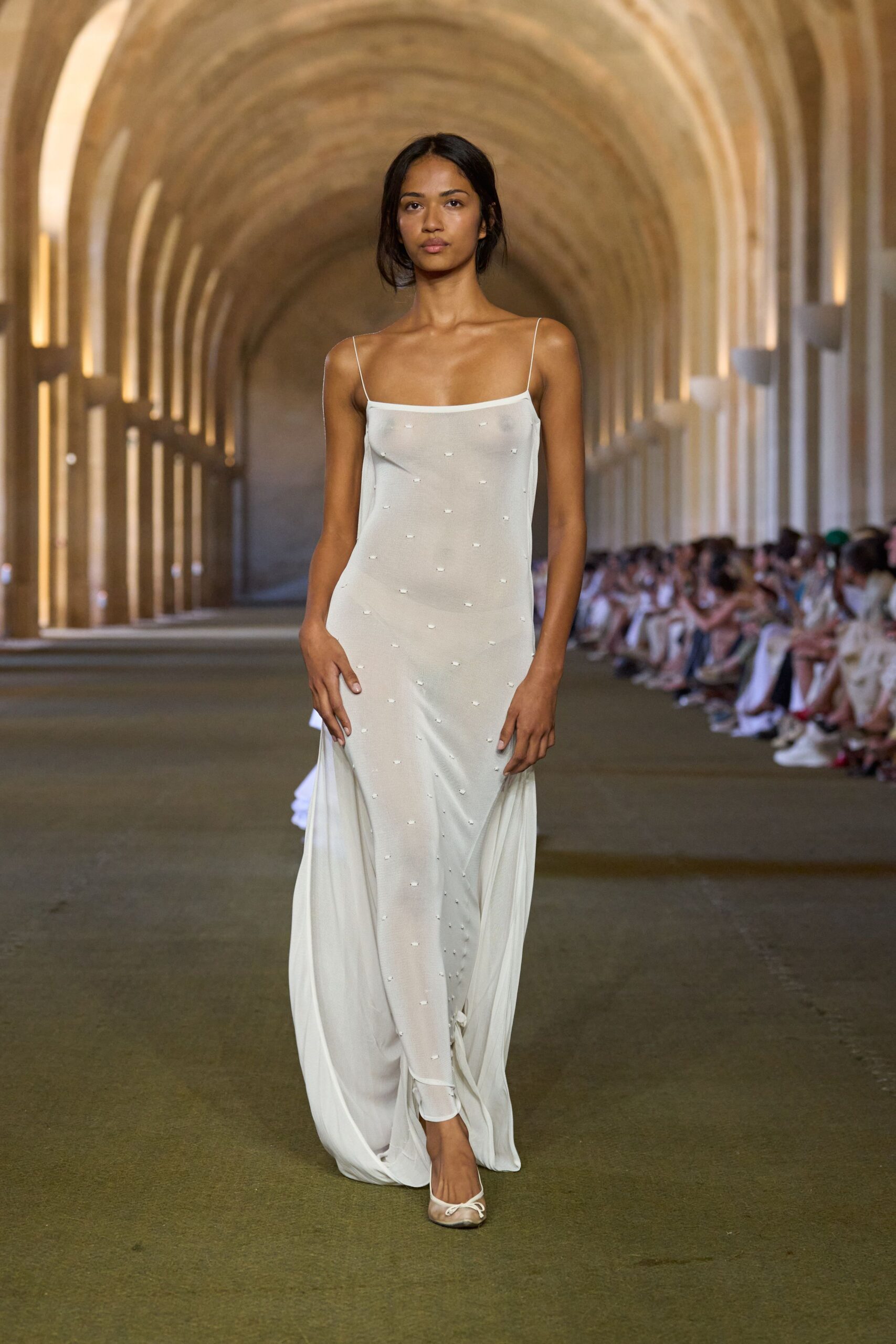 white silk sleeveless gown