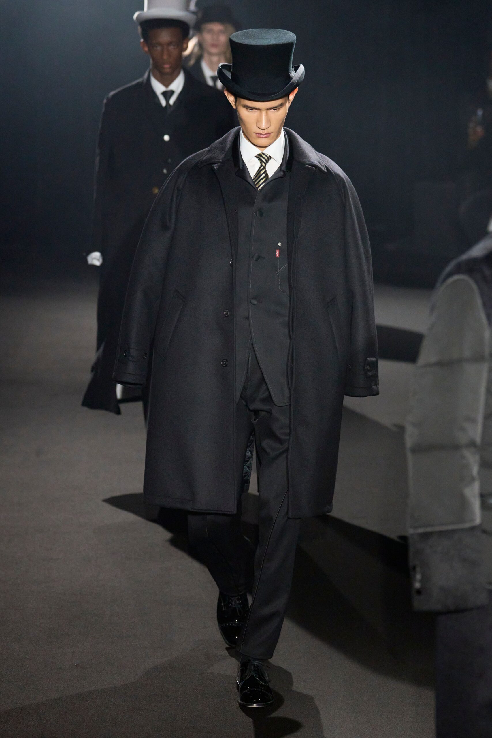 black wool coat and suit
