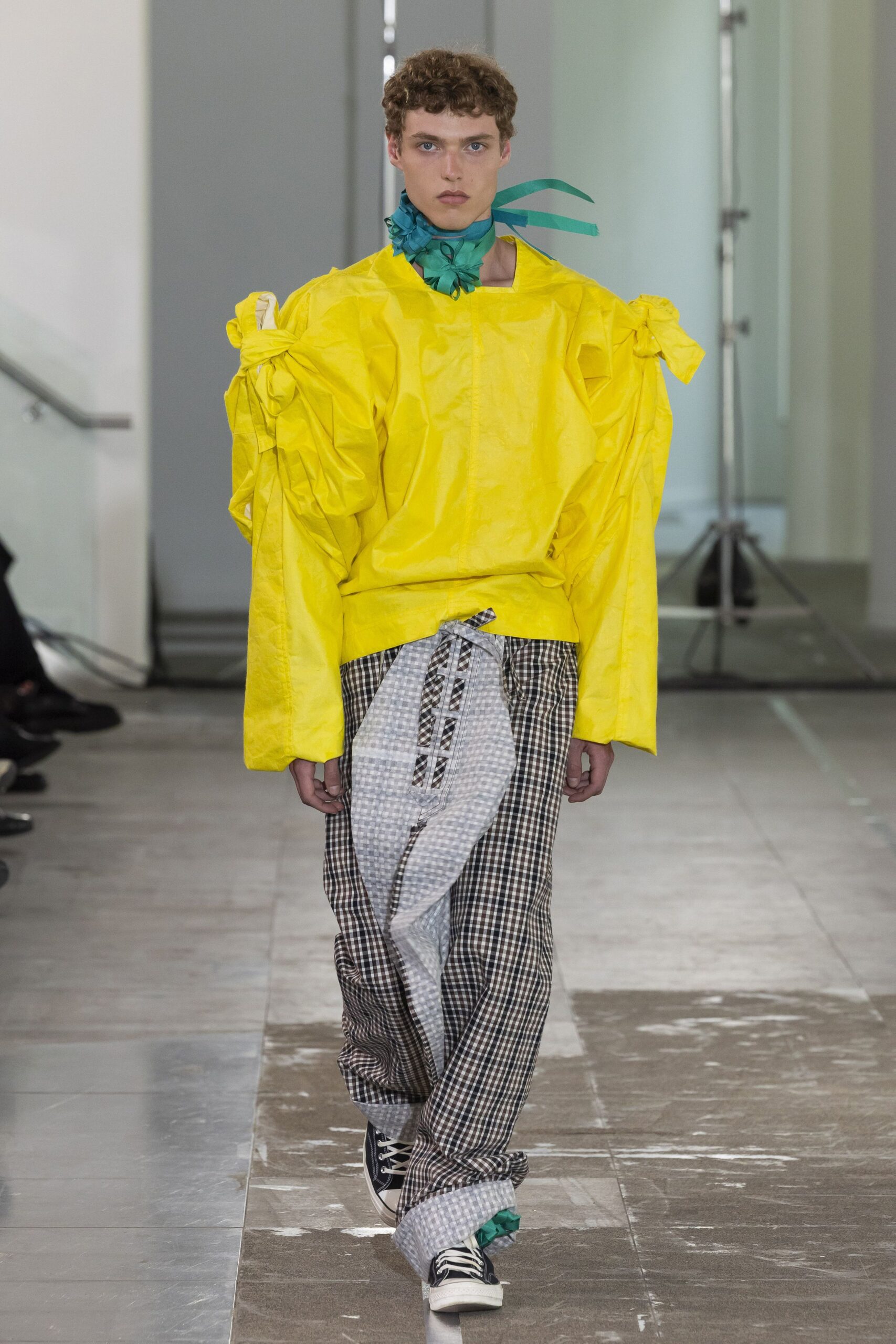 yellow relaxed top with checked pants