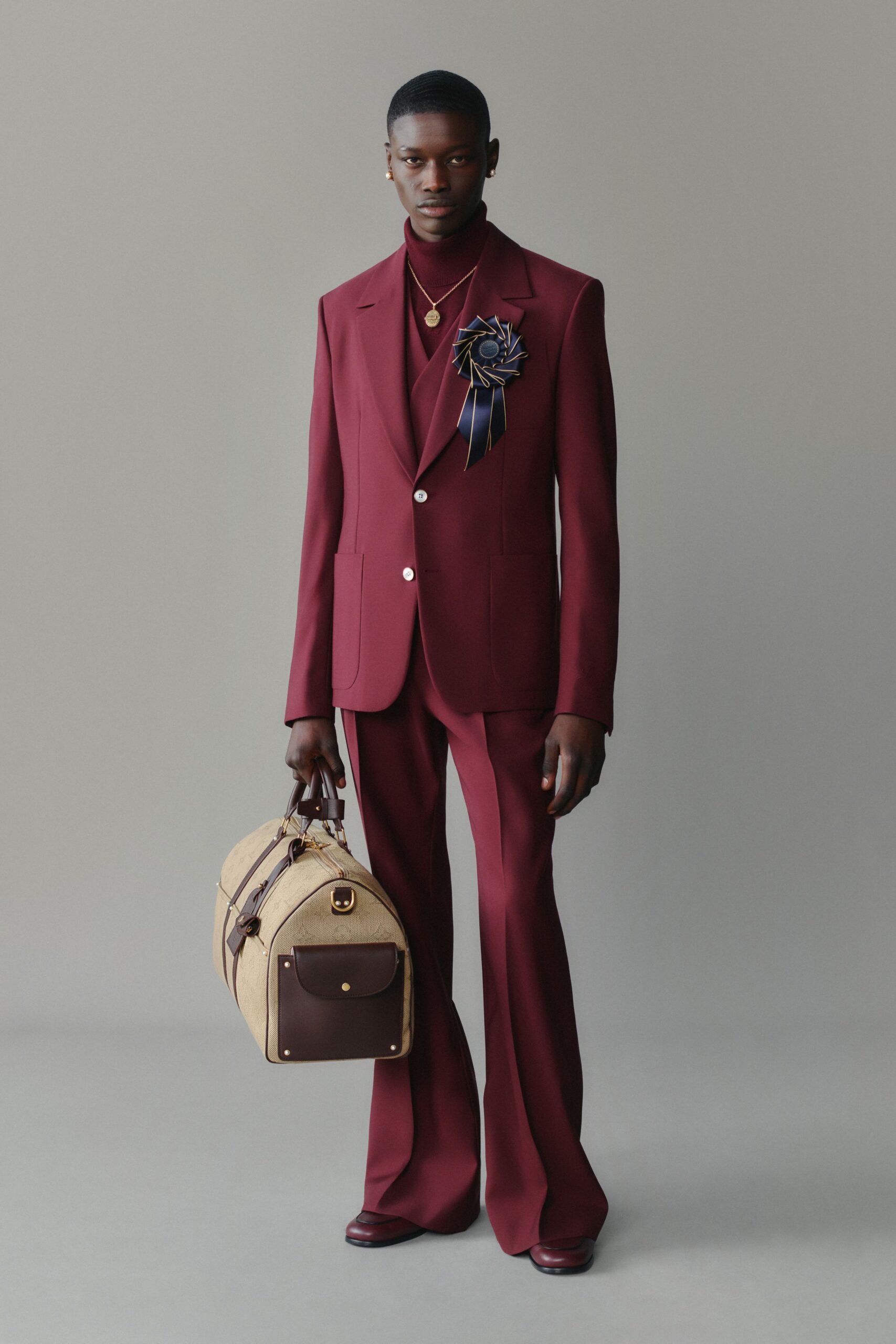 maroon long-sleeve collared tailored buttoned suit
