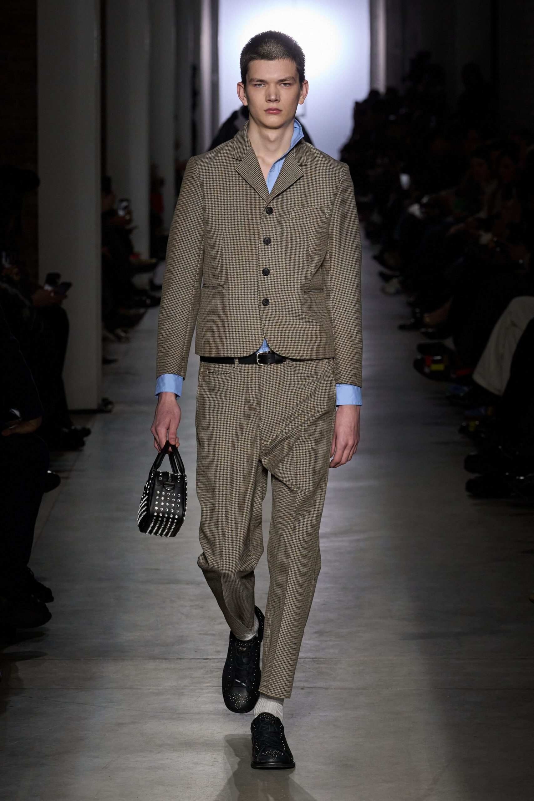 gray tailored suit with blue shirt