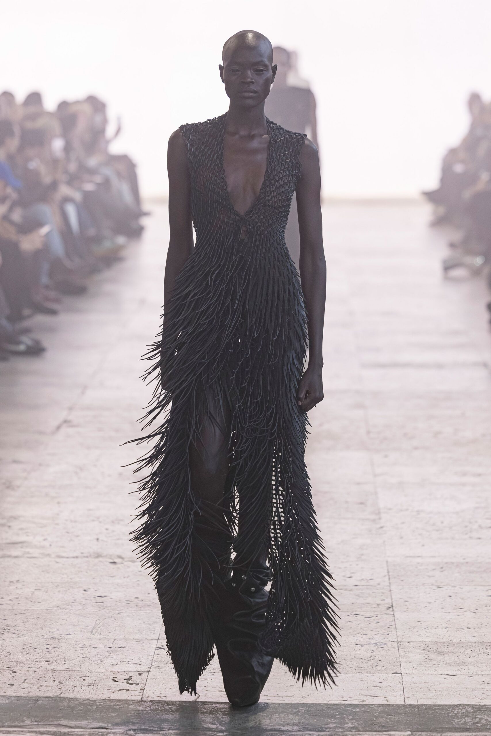 black fringed maxi gown with boots
