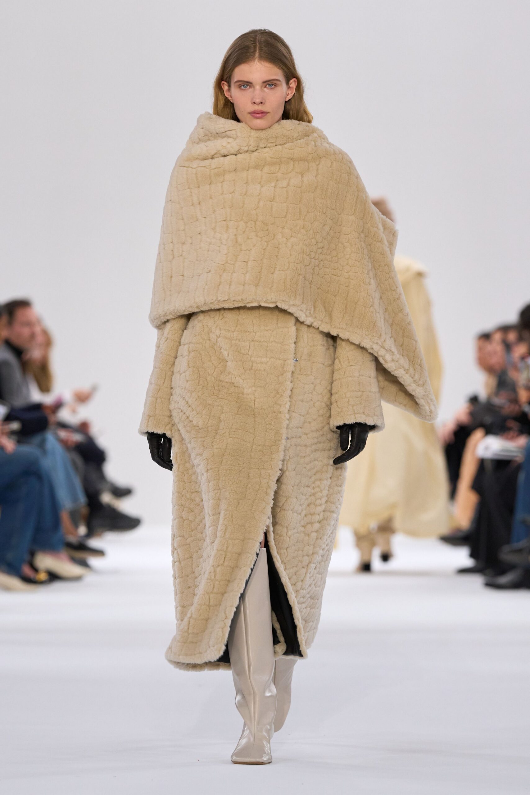 beige faux-fur coat with white boots