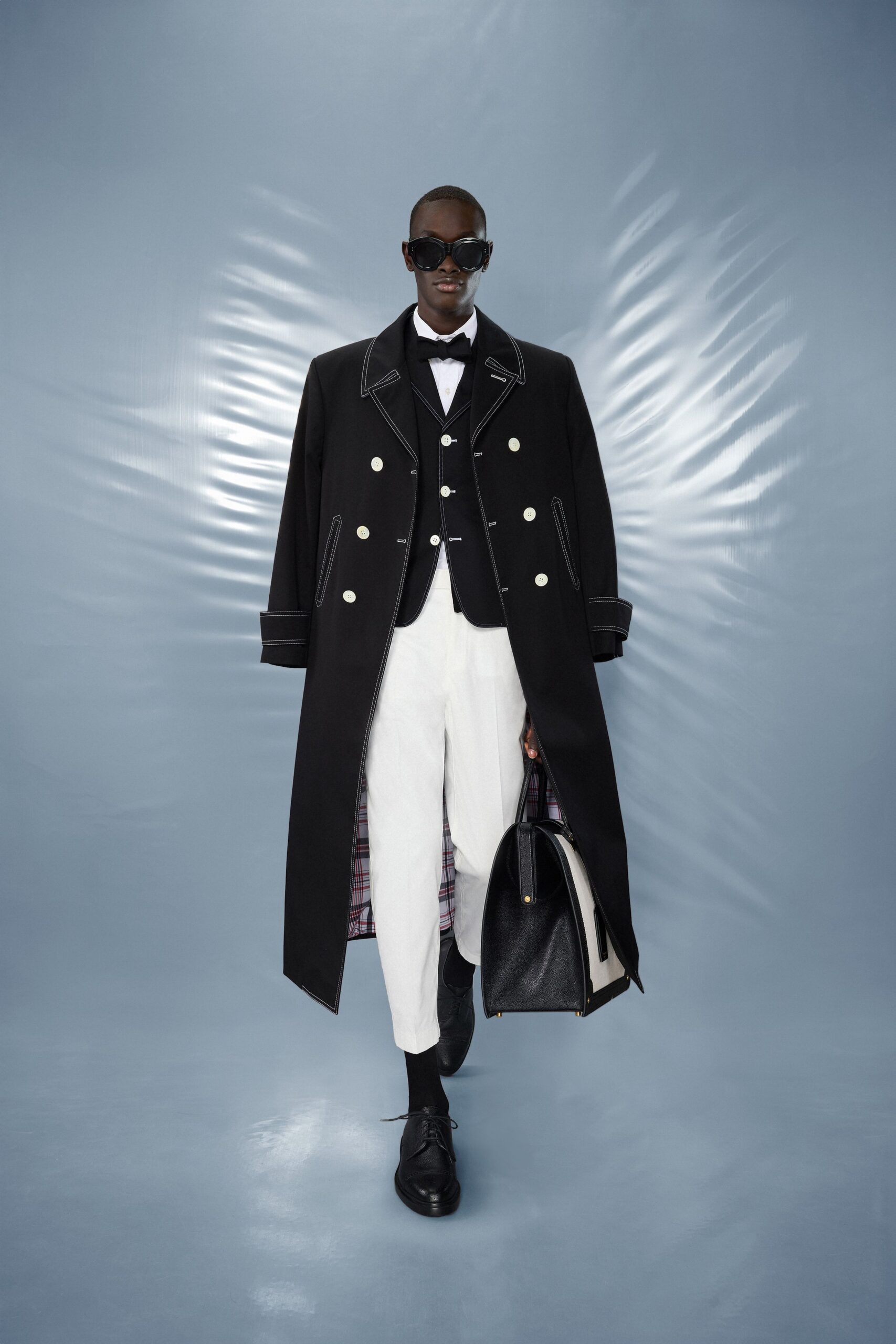 black wool long-sleeve collared tailored buttoned coat