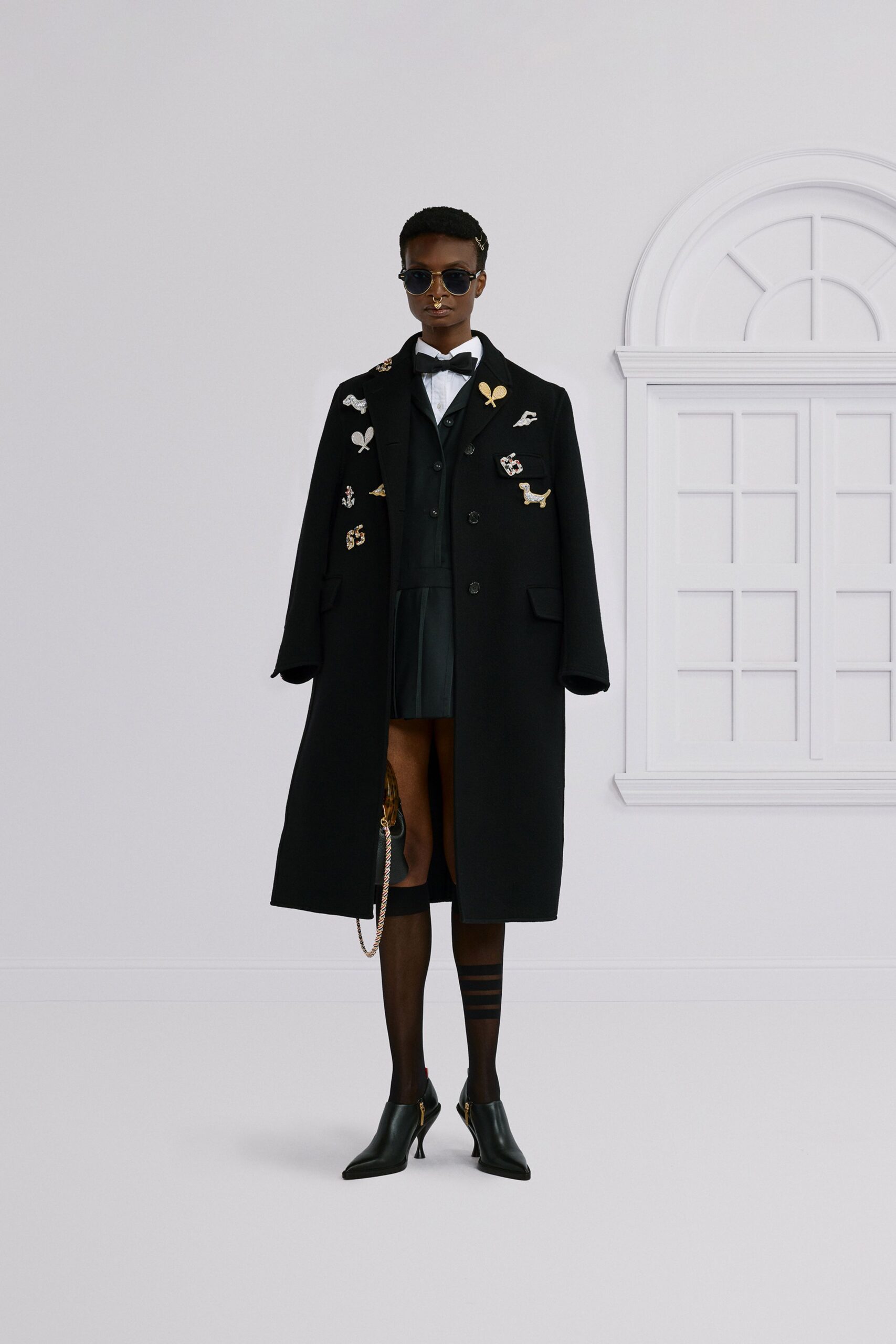 black oversized coat with vest and shorts