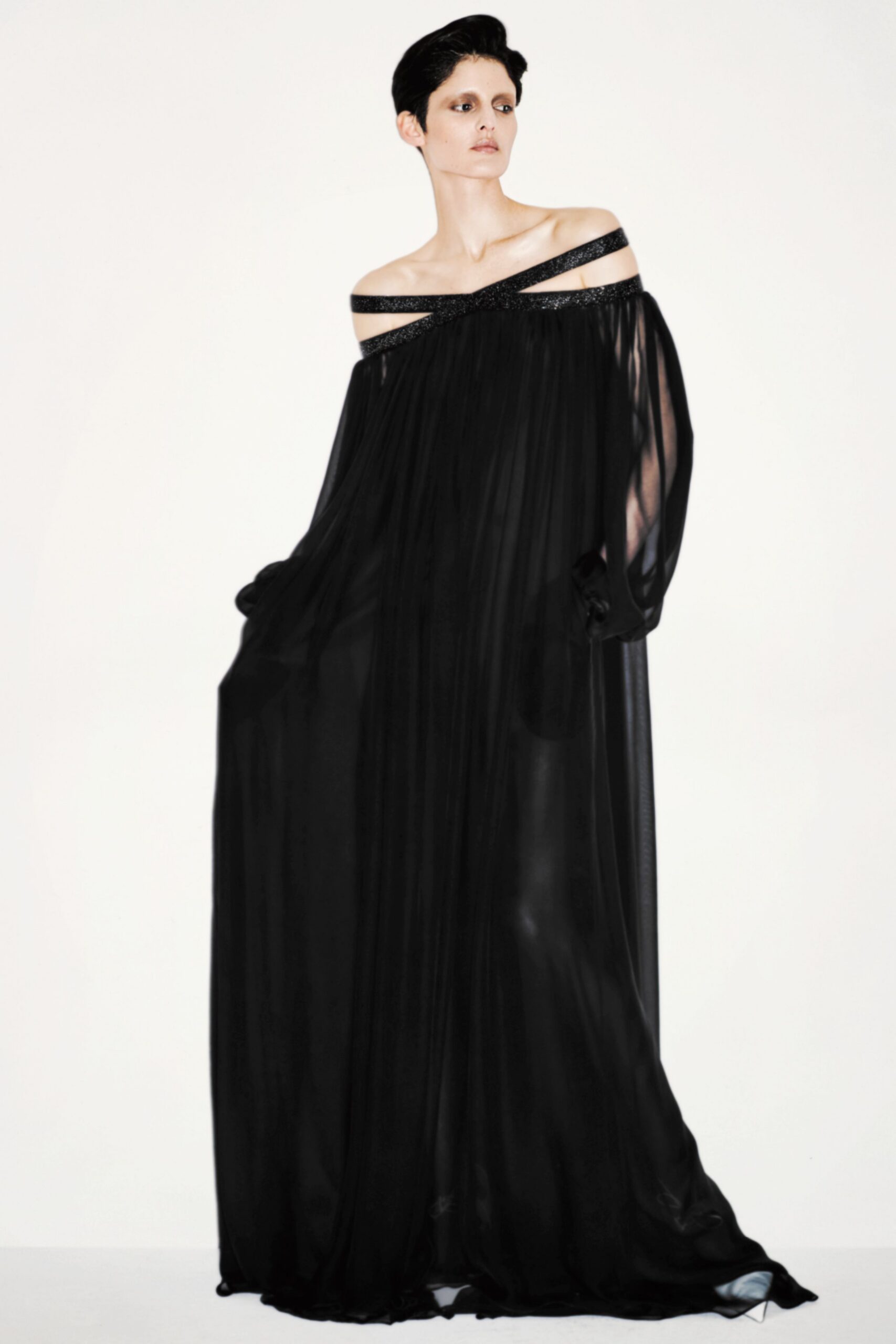 black sheer off-shoulder gown