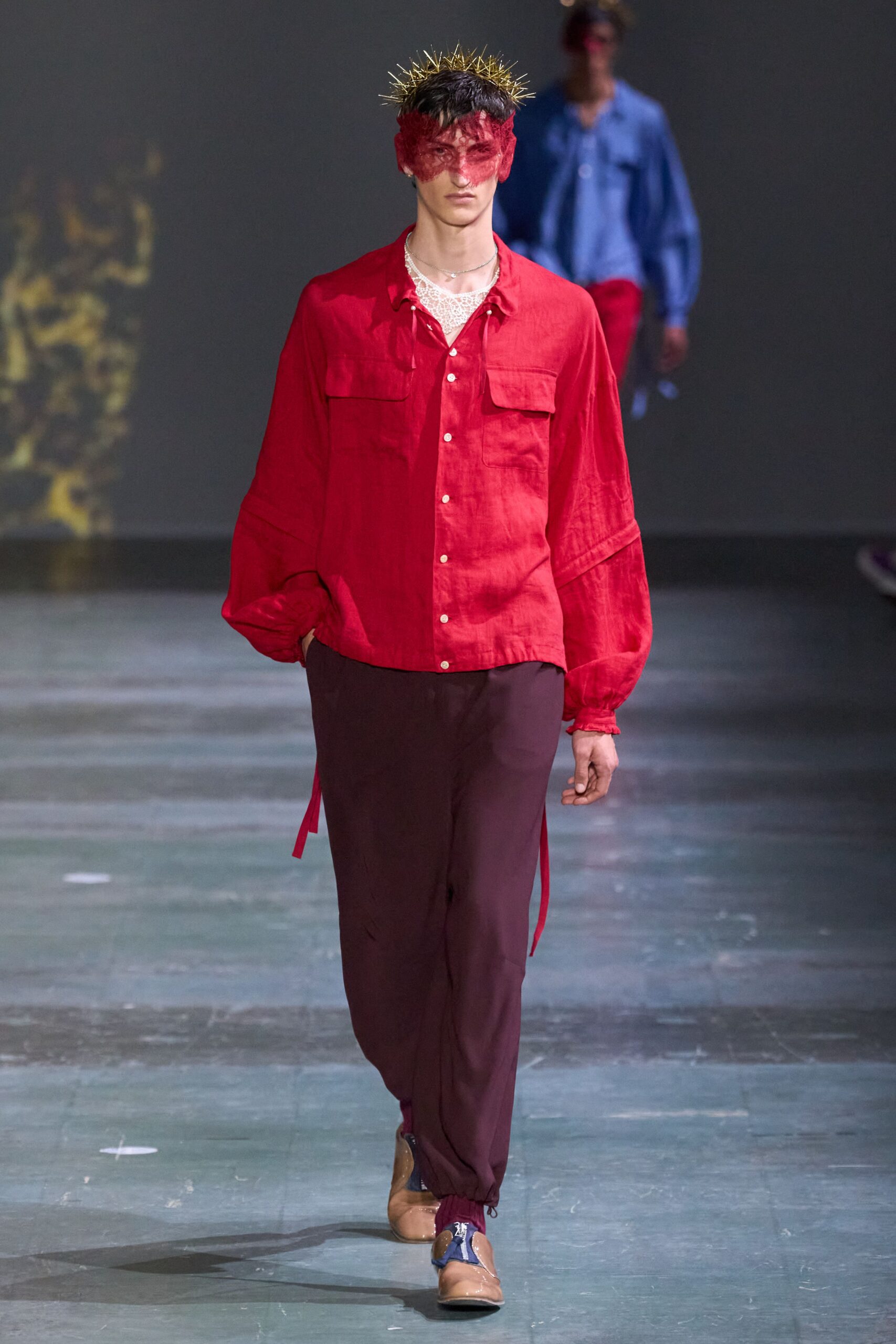 red oversized shirt with brown pants