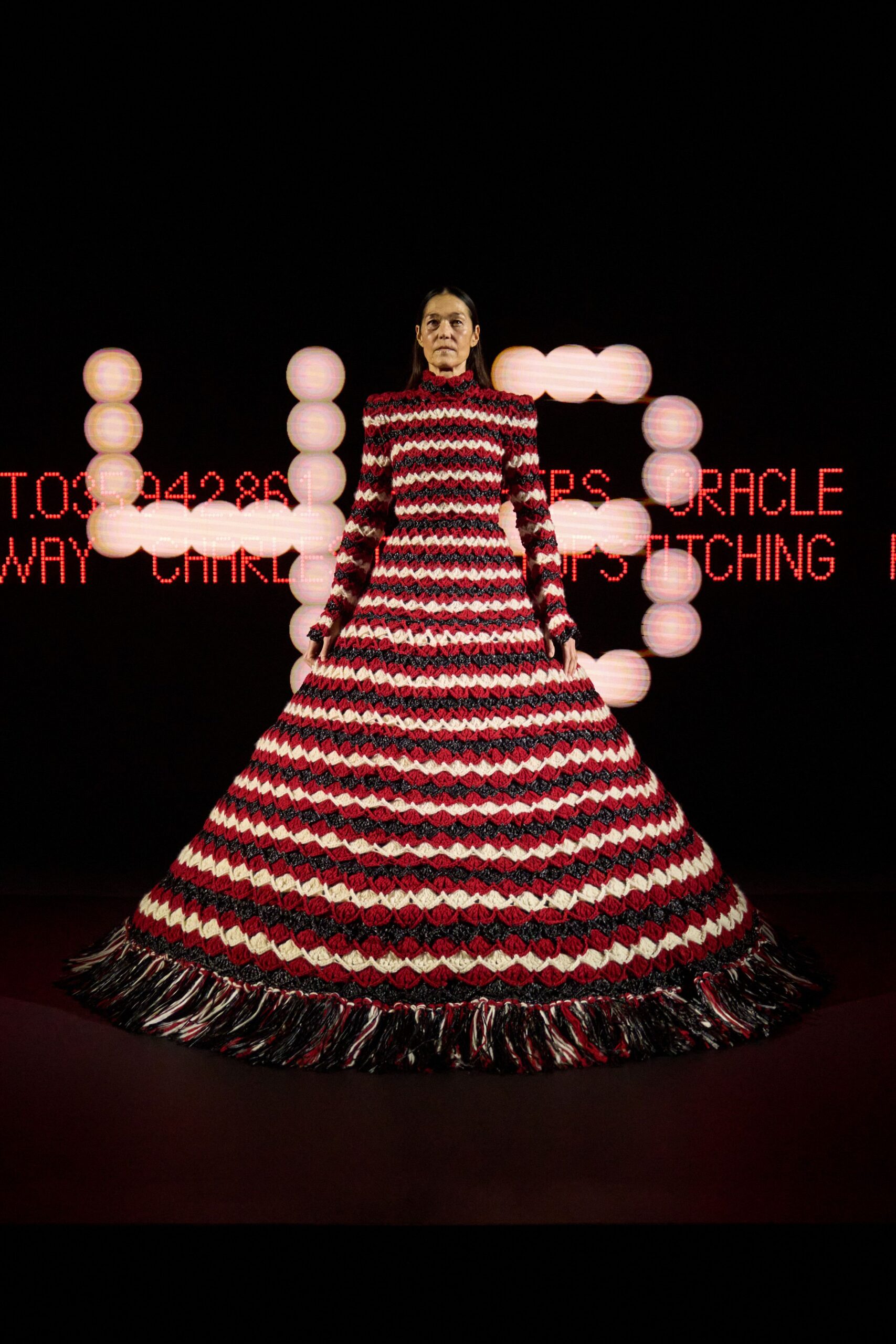 red and white pleated gown