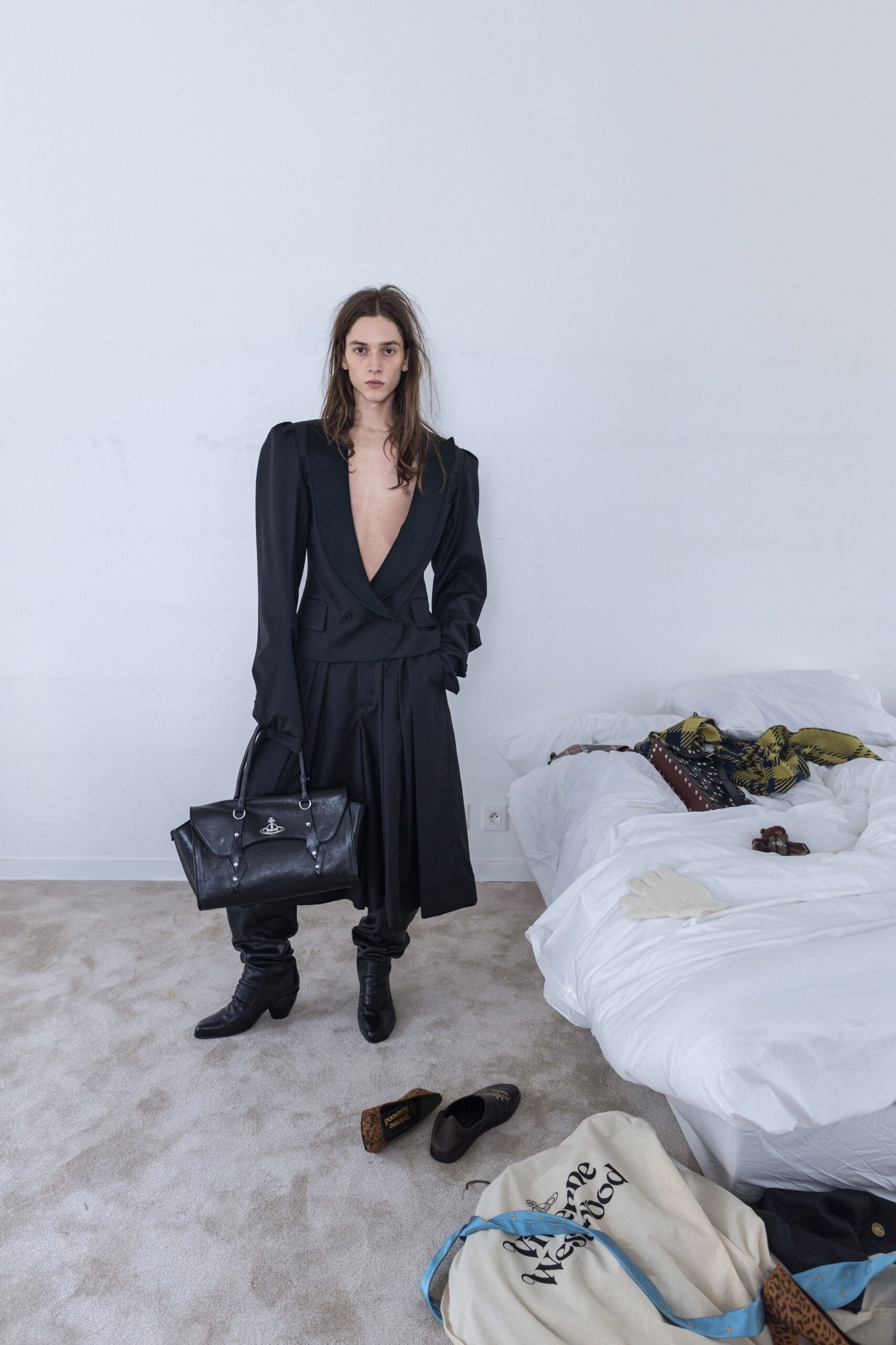 black fitted midi dress with bag
