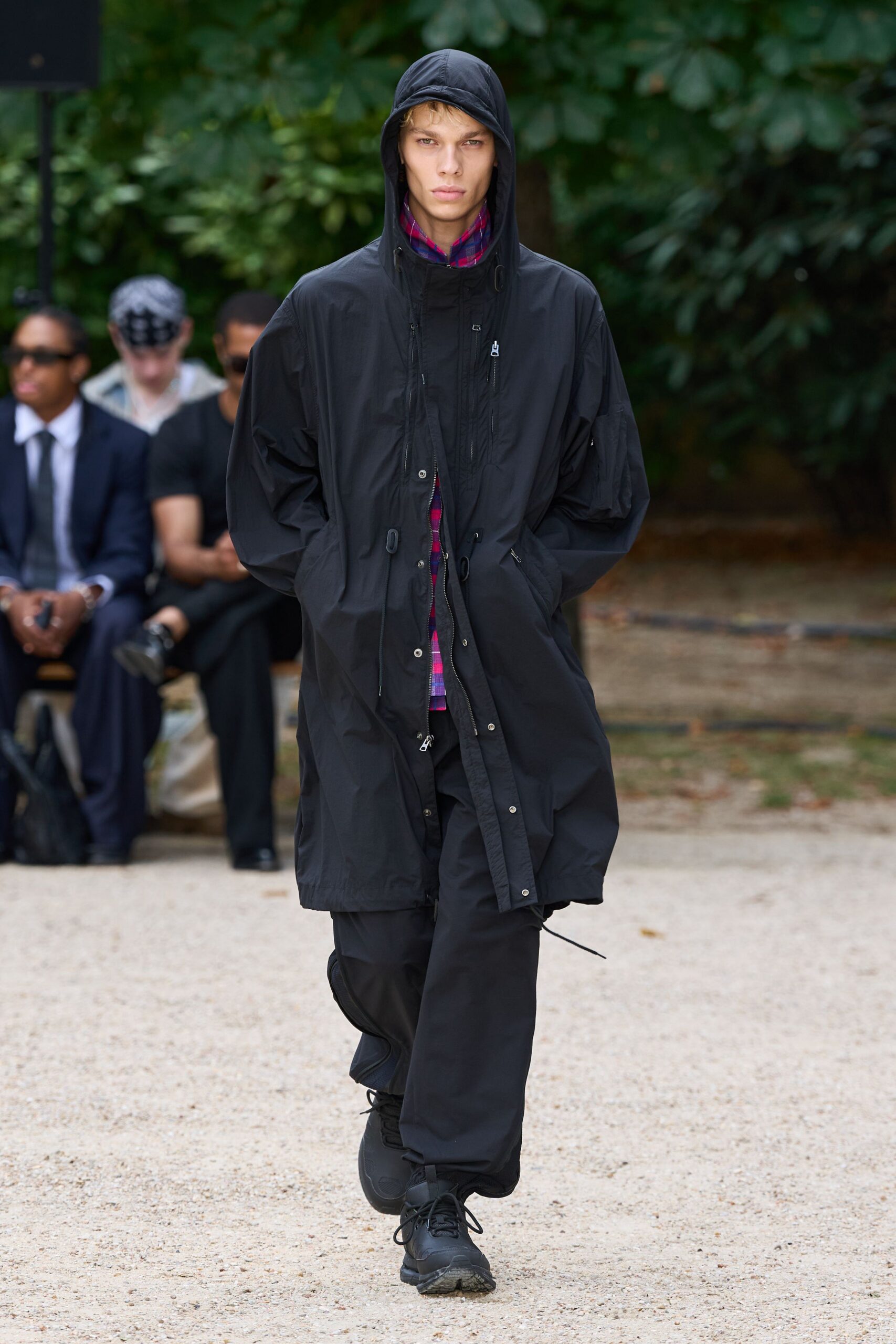 black parka with relaxed pants