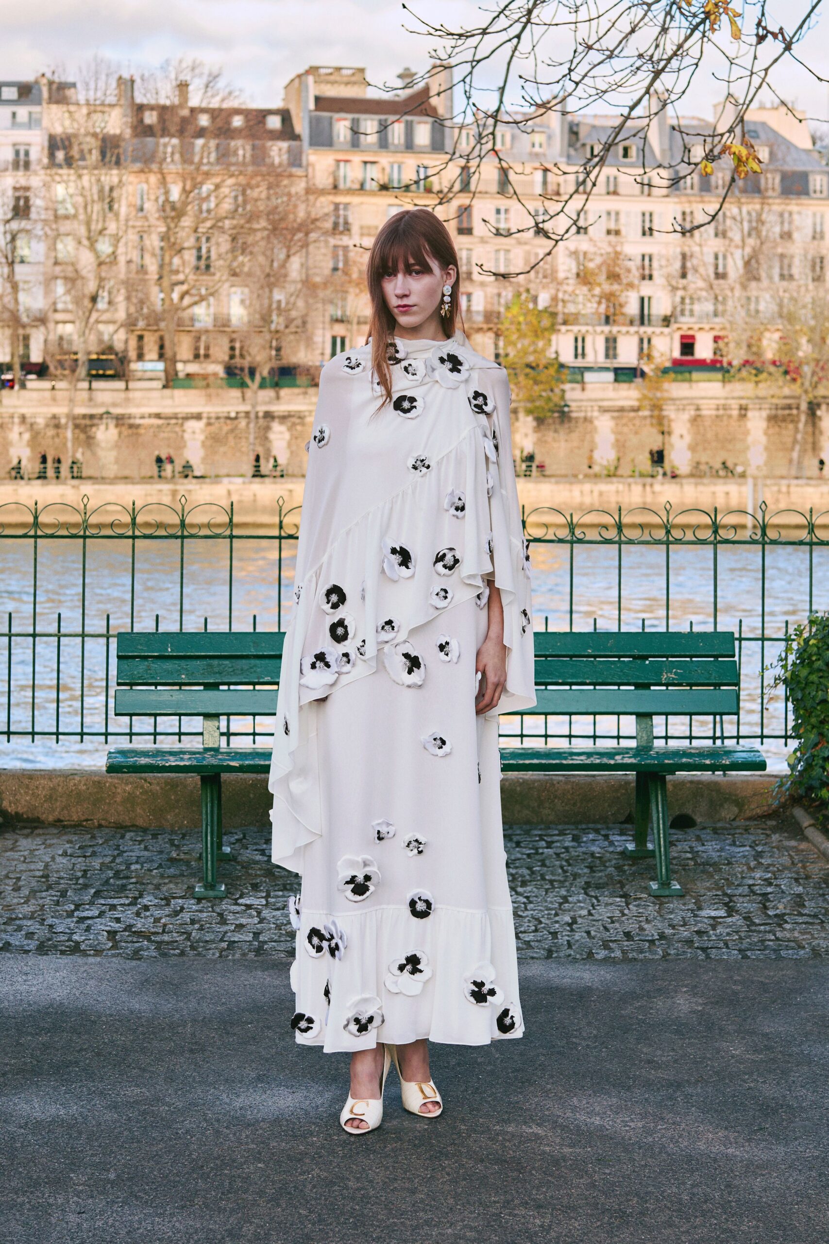 white floral maxi gown with open-toe shoes