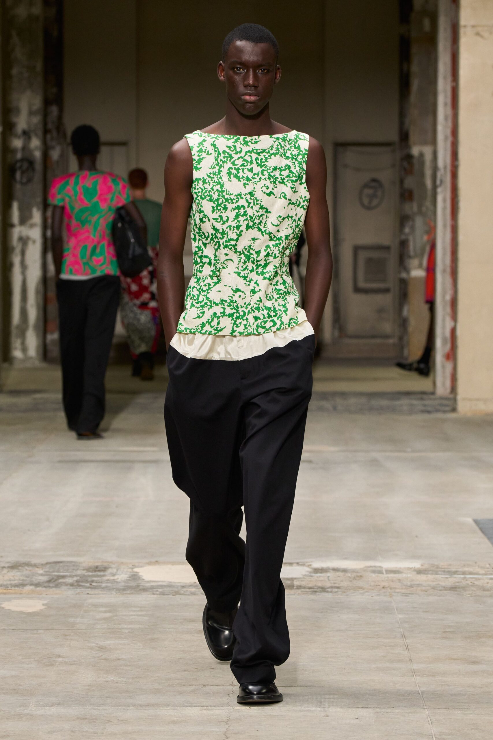 green sleeveless fitted flared top