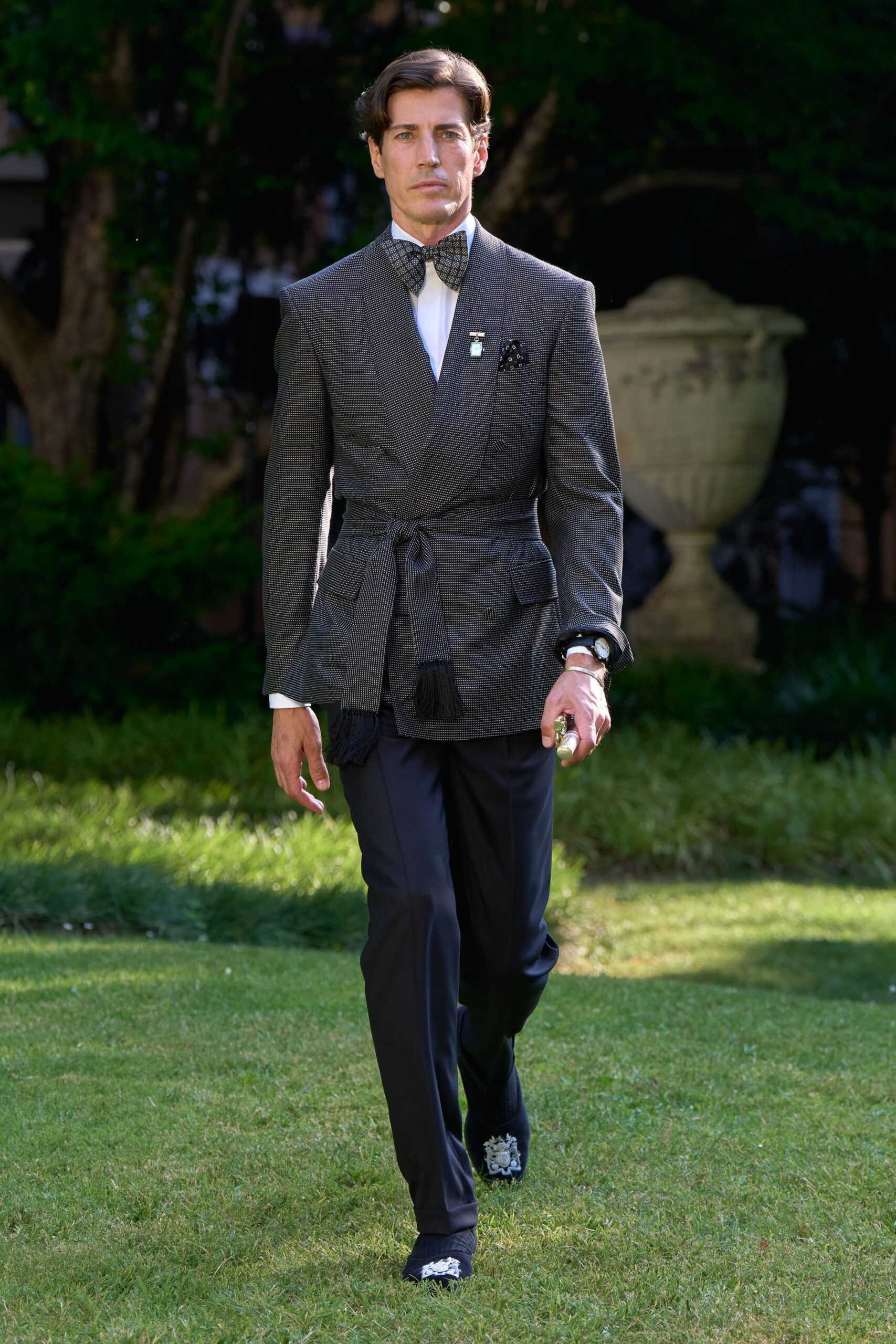 gray tailored blazer with black pants