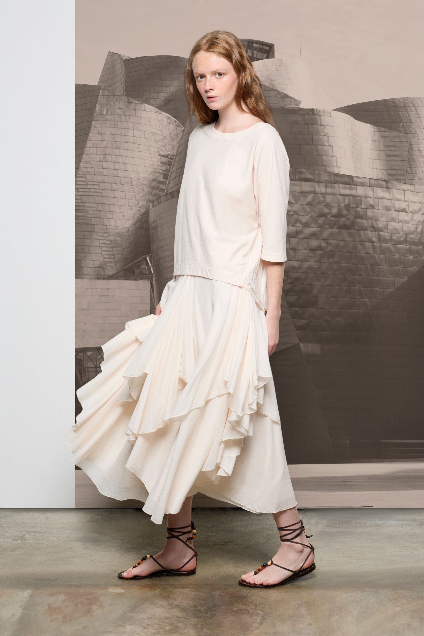 white relaxed top beige tiered skirt