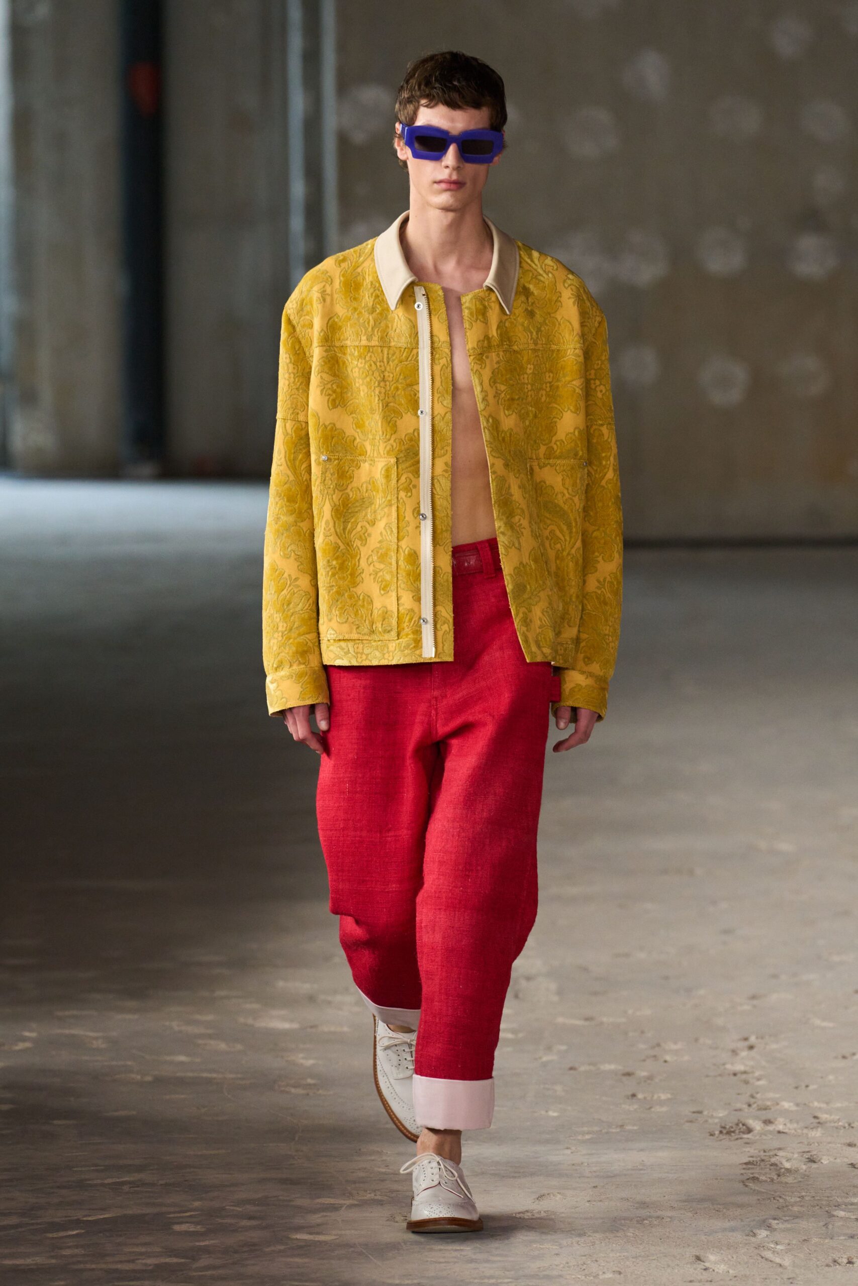 yellow printed jacket with red pants
