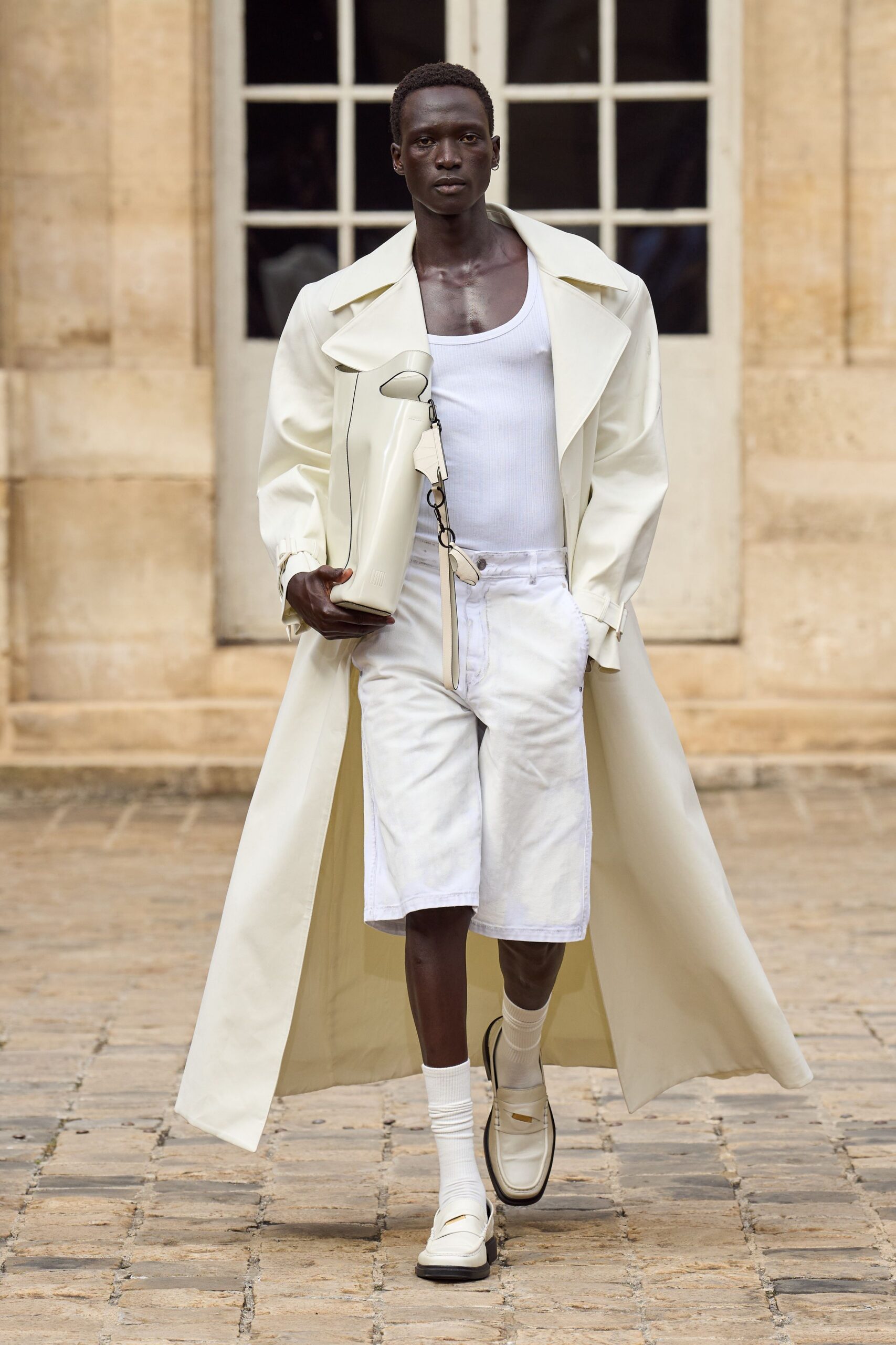 white cotton long-sleeve collared relaxed buttoned coat