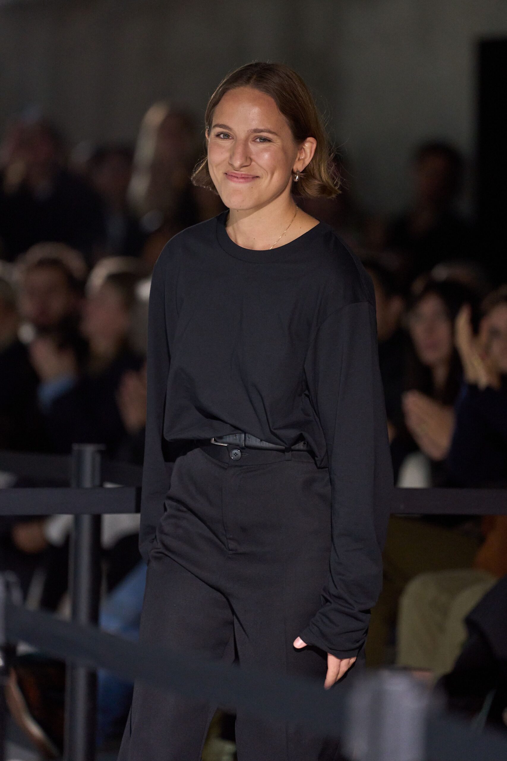 black relaxed top and tailored pants