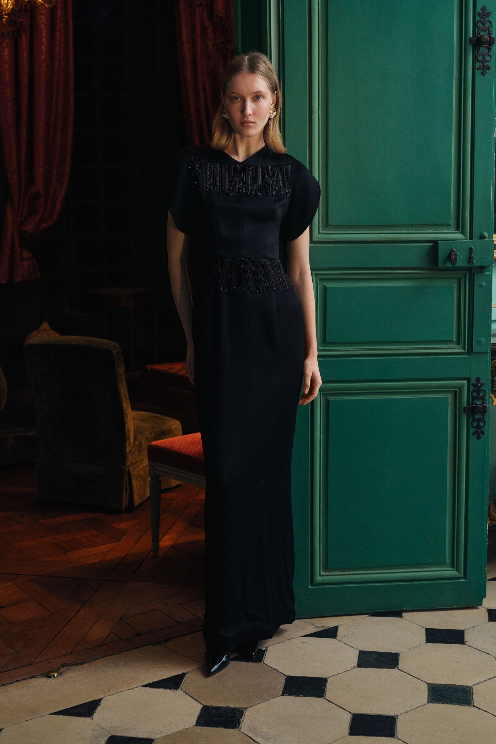 black silk short-sleeve high-neck fitted beaded draped gown