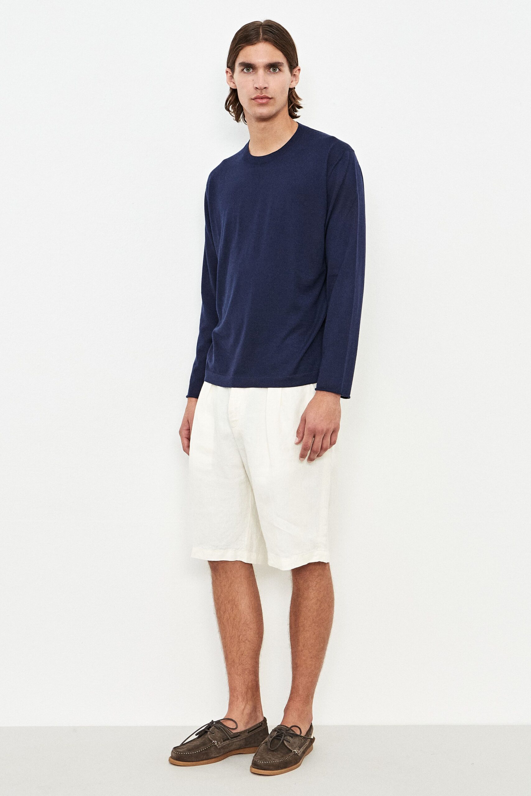 blue relaxed shirt with white shorts