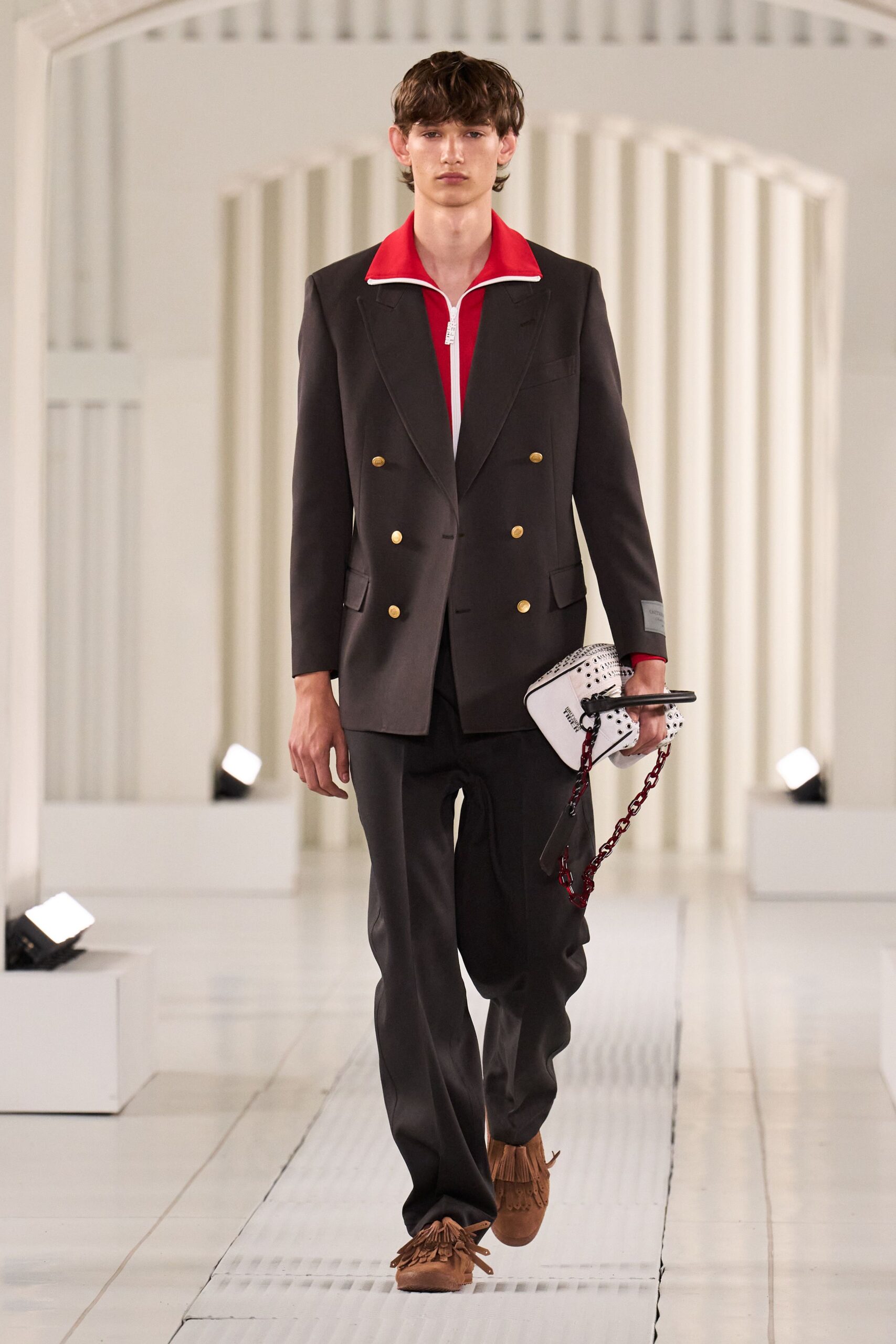 black tailored suit with red shirt