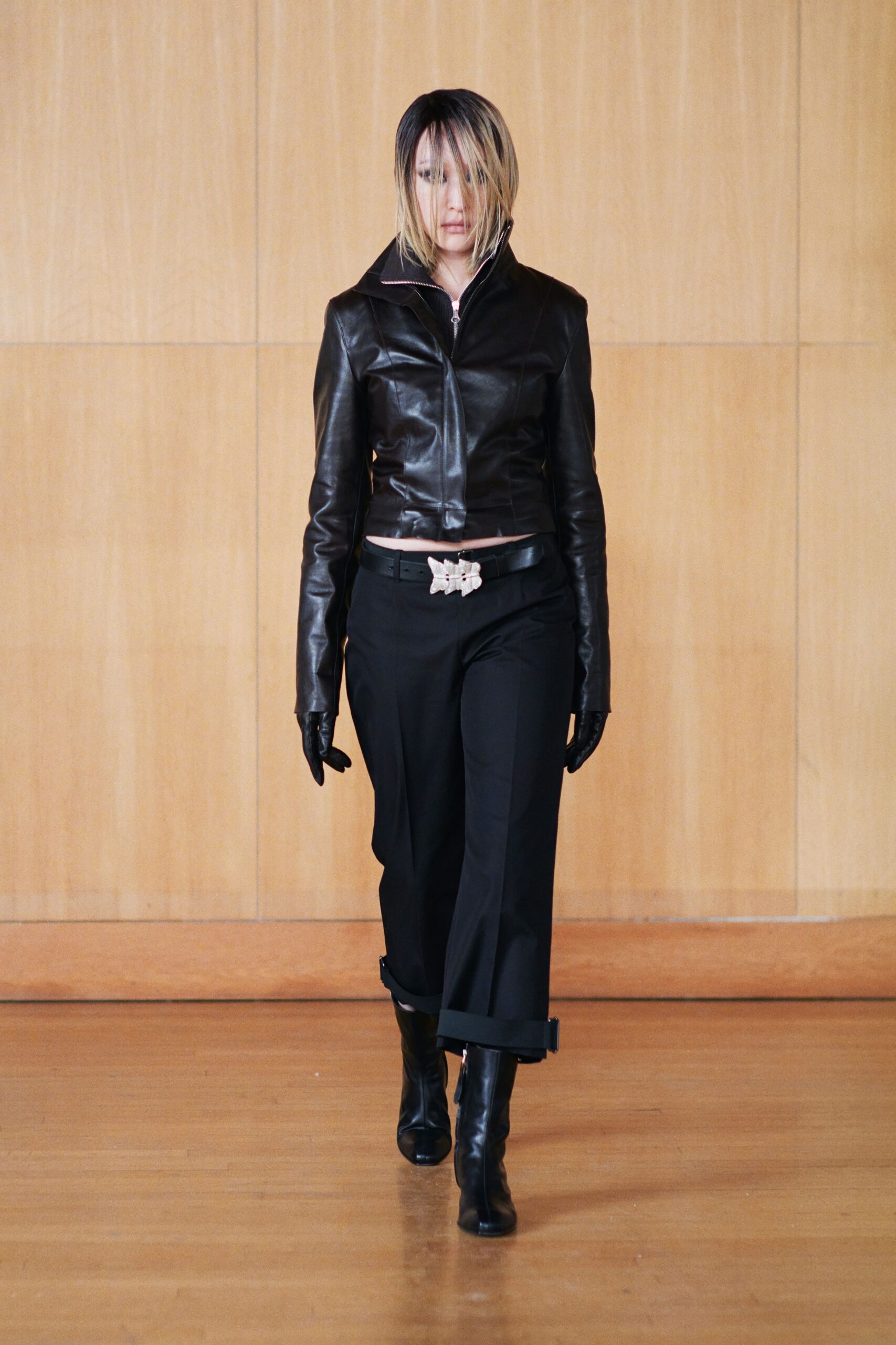 black leather jacket with relaxed pants