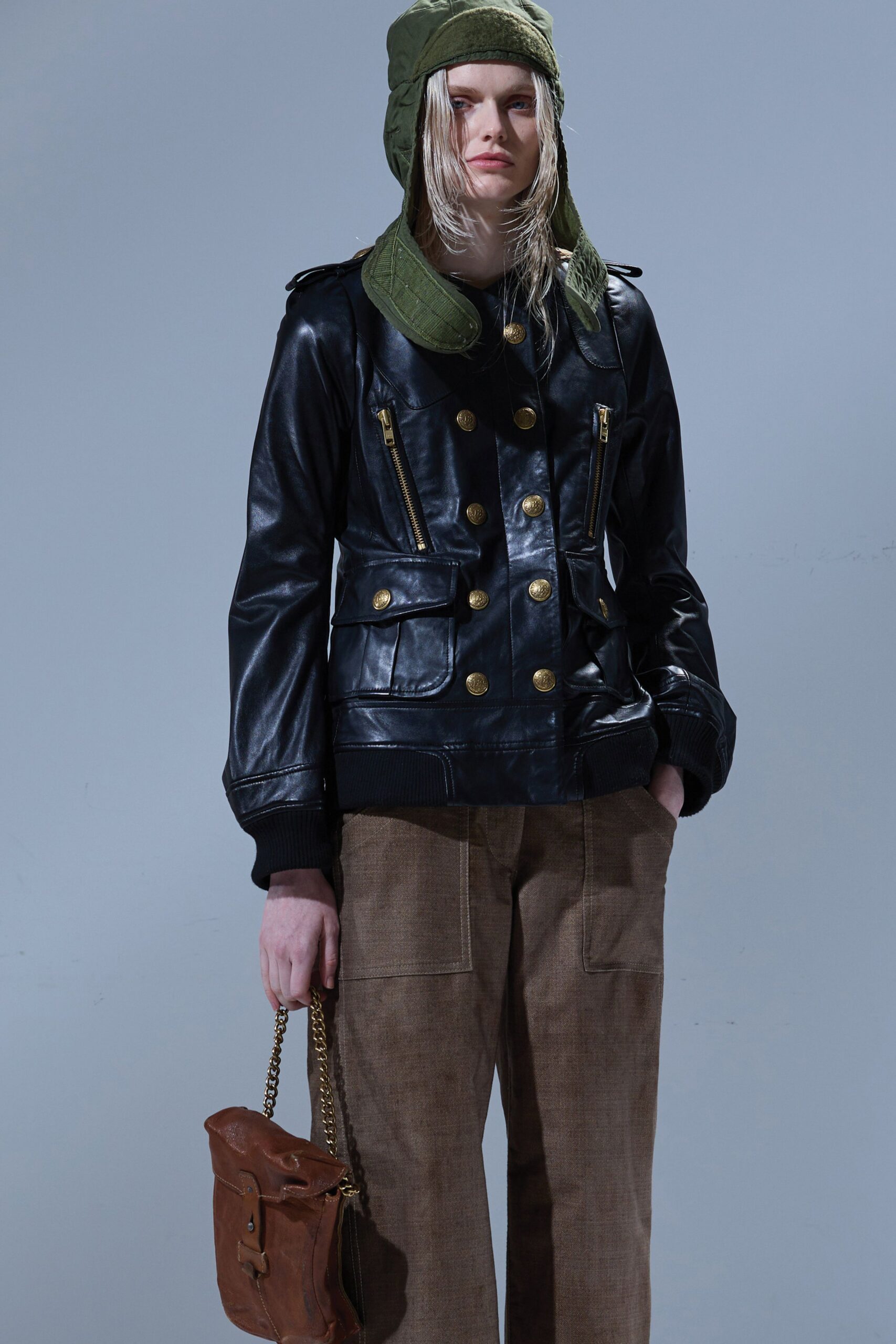 black leather long-sleeve collared fitted zippered buttoned jacket