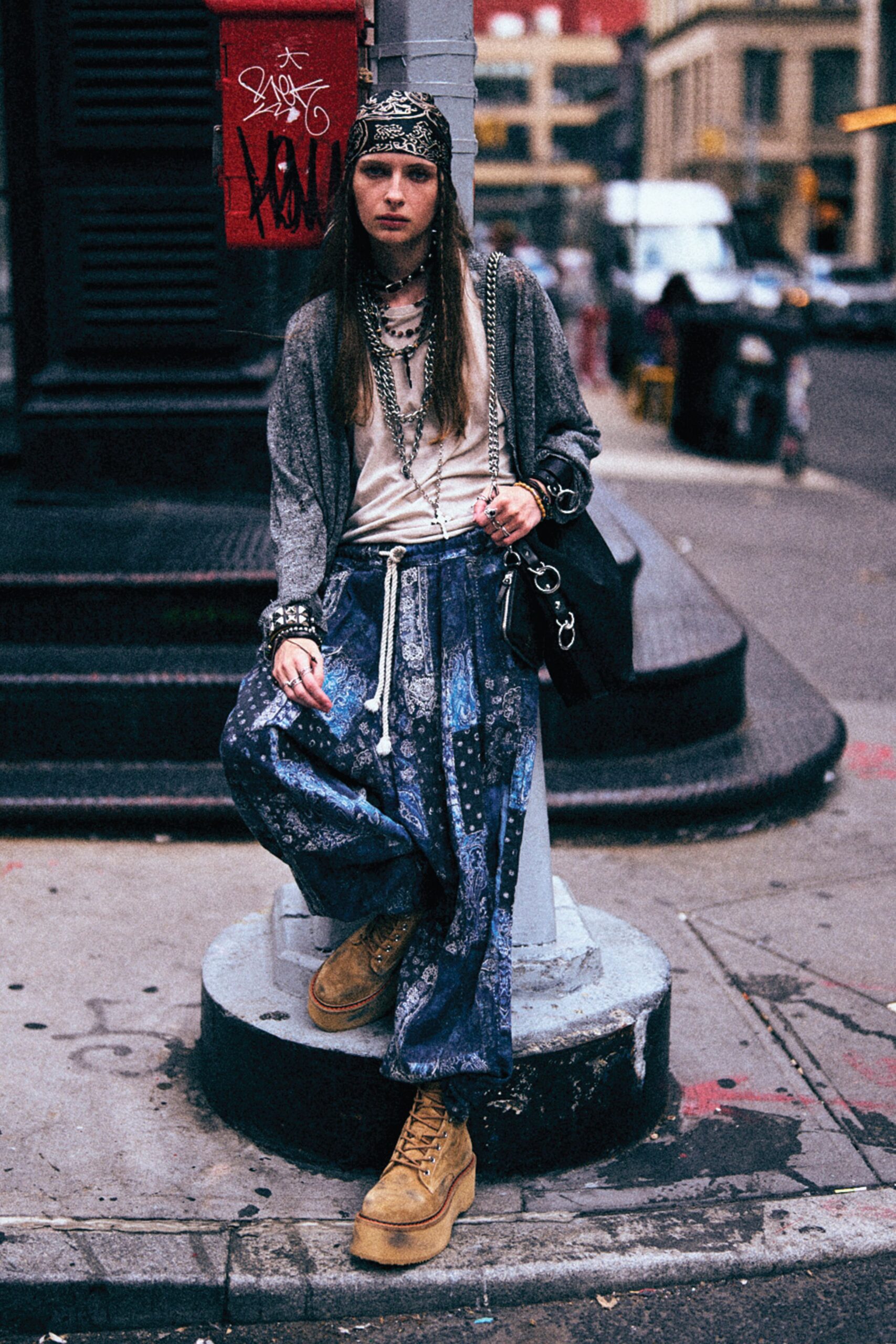 gray cardigan white top blue pants