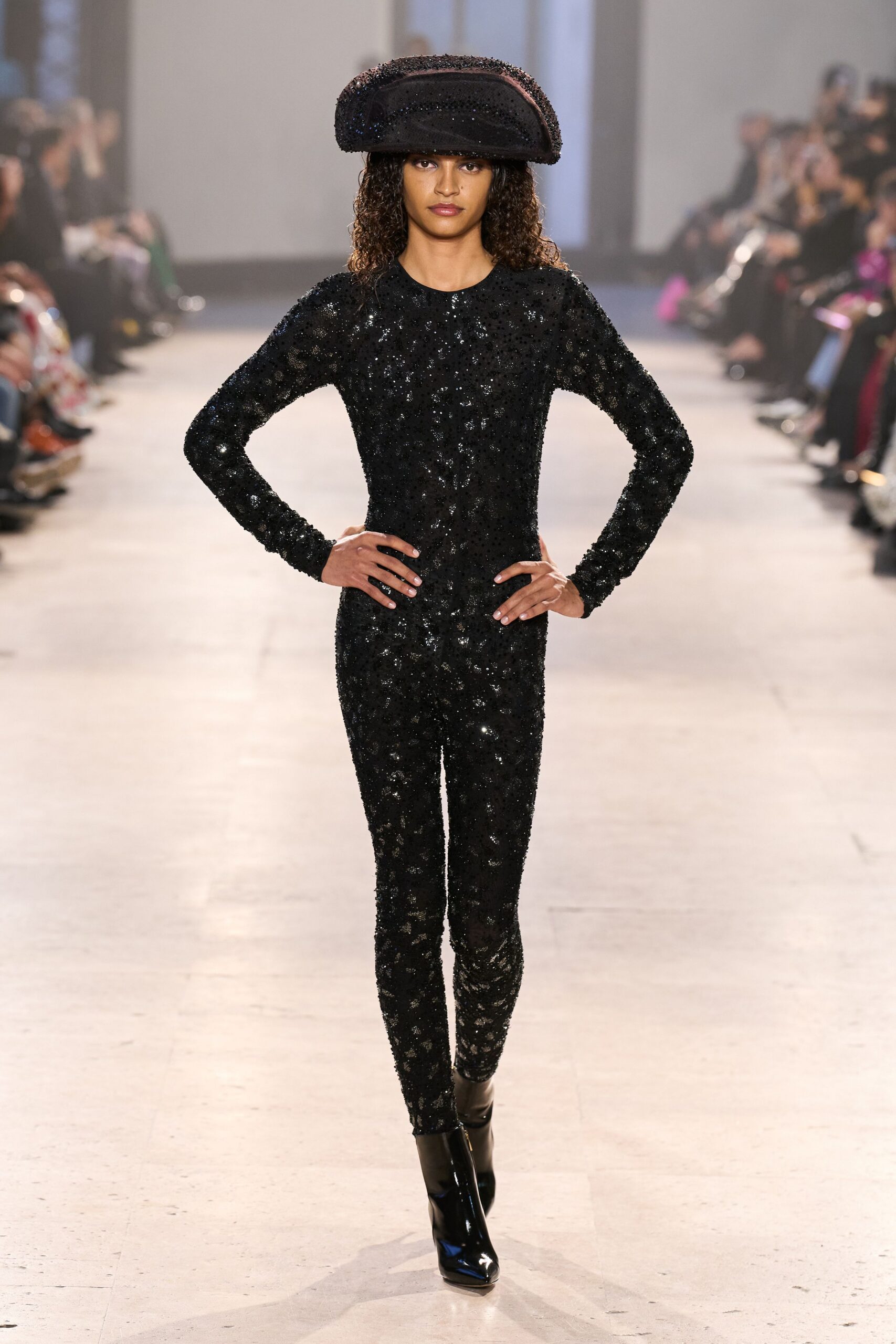 black long-sleeve high-neck fitted sequined shiny catsuit