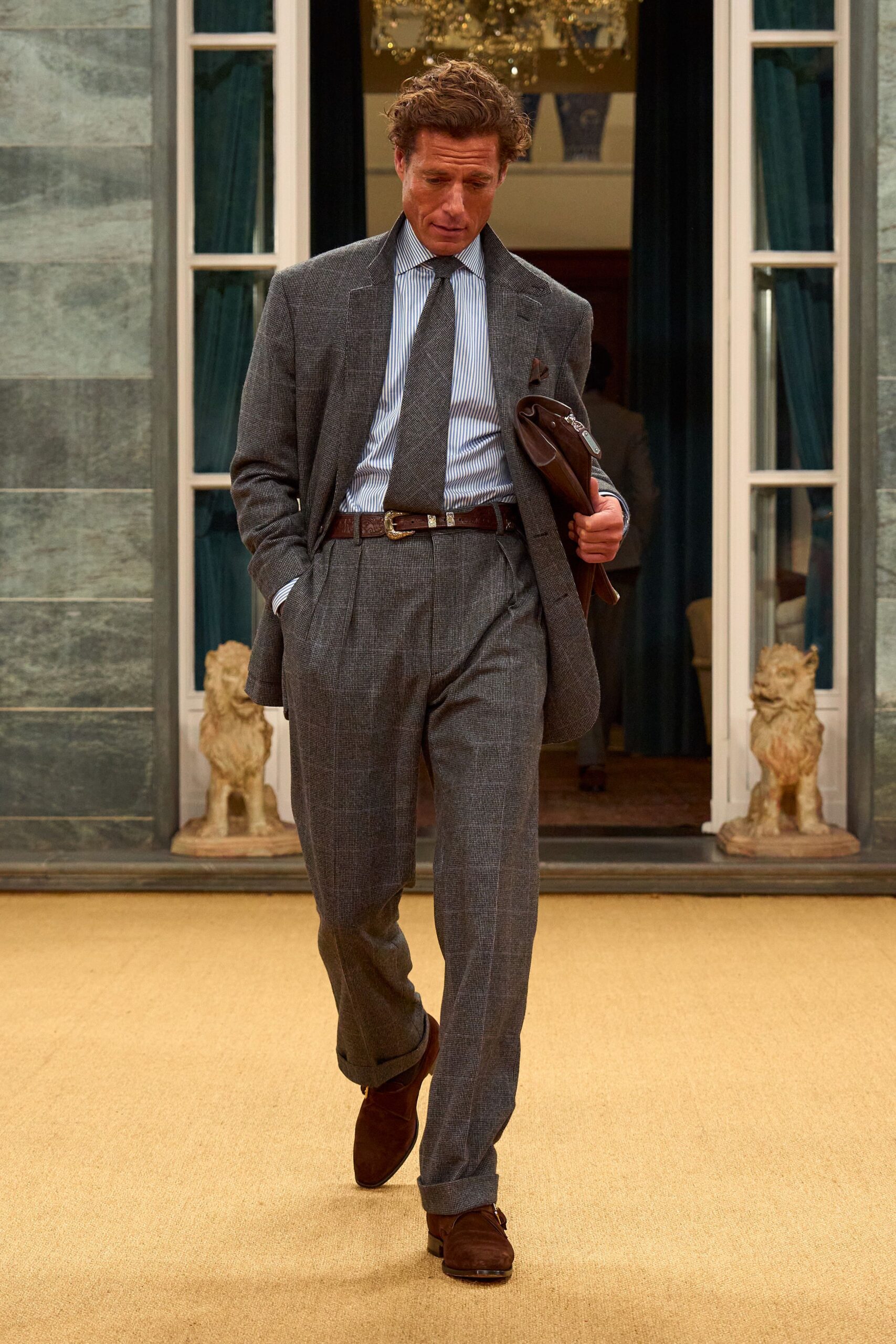 gray tailored suit with blue shirt