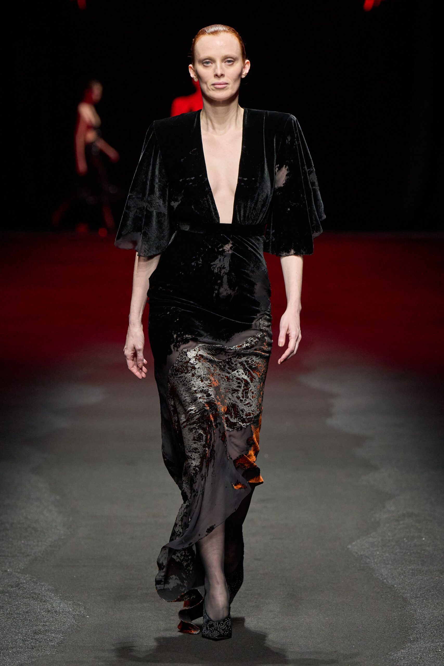 black velvet gown with embellished shoes