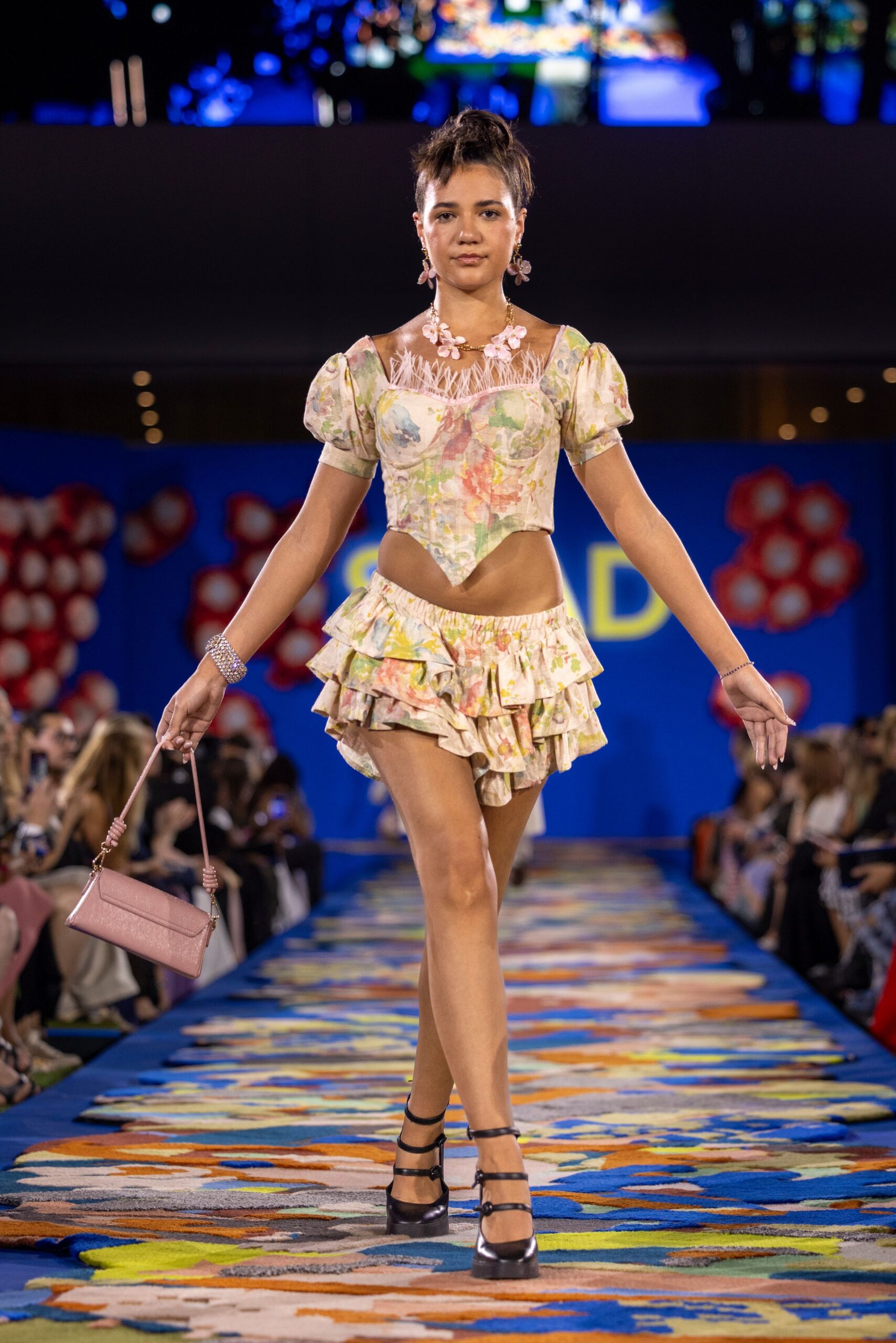 multi-colored ruffled top and skirt