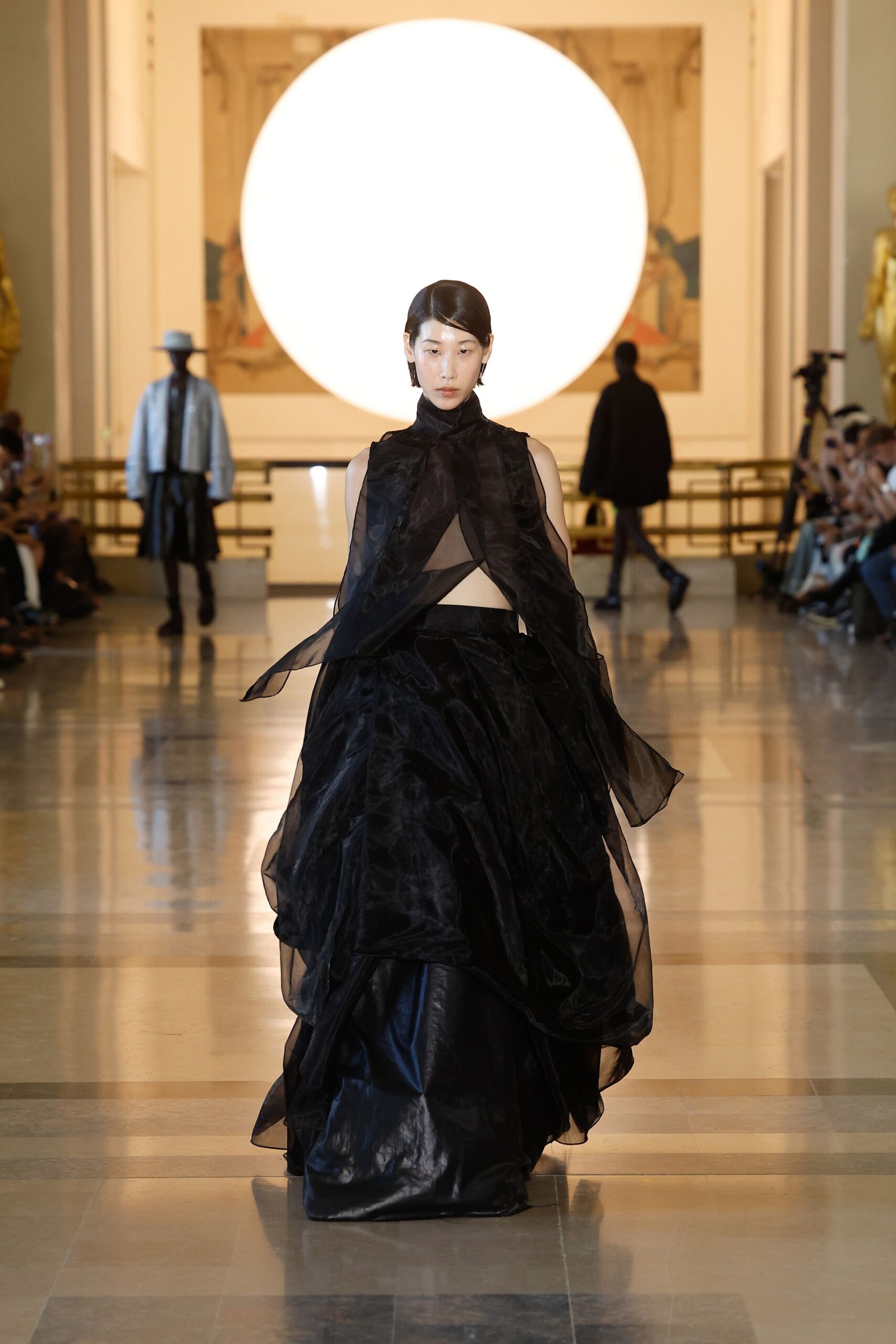 black silk sleeveless high-neck fitted layered flared gown