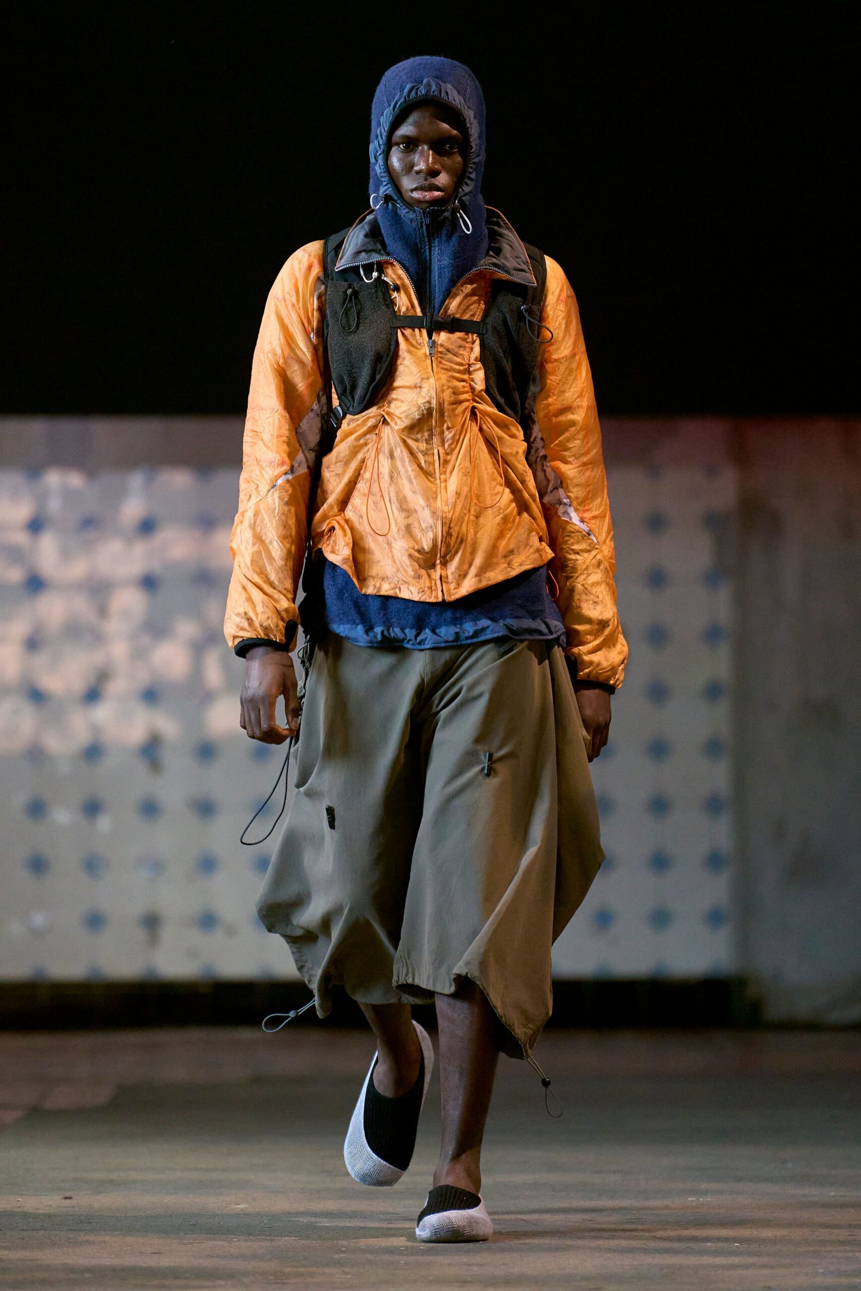 orange hooded jacket with cargo pants