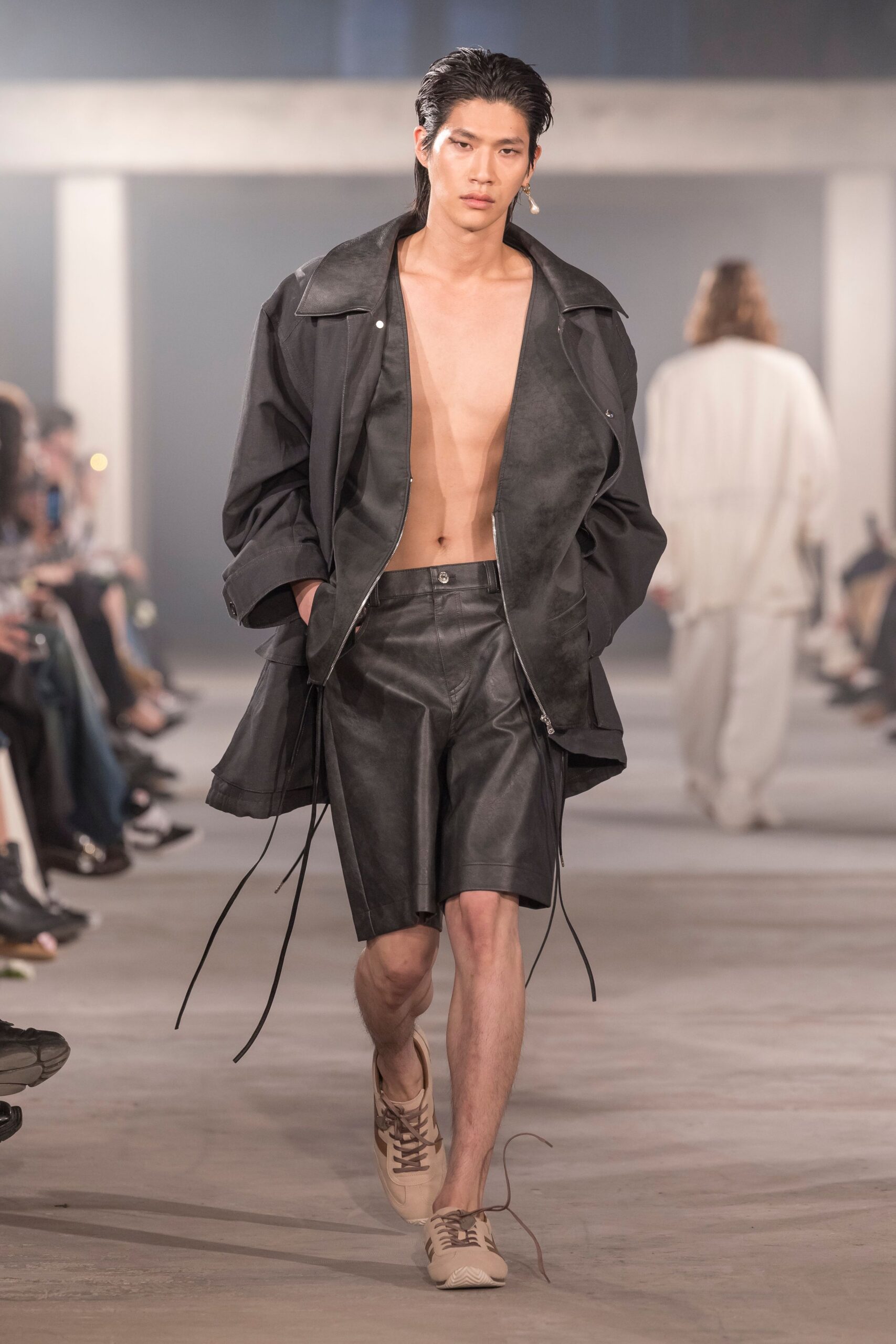 black leather oversized coat and shorts