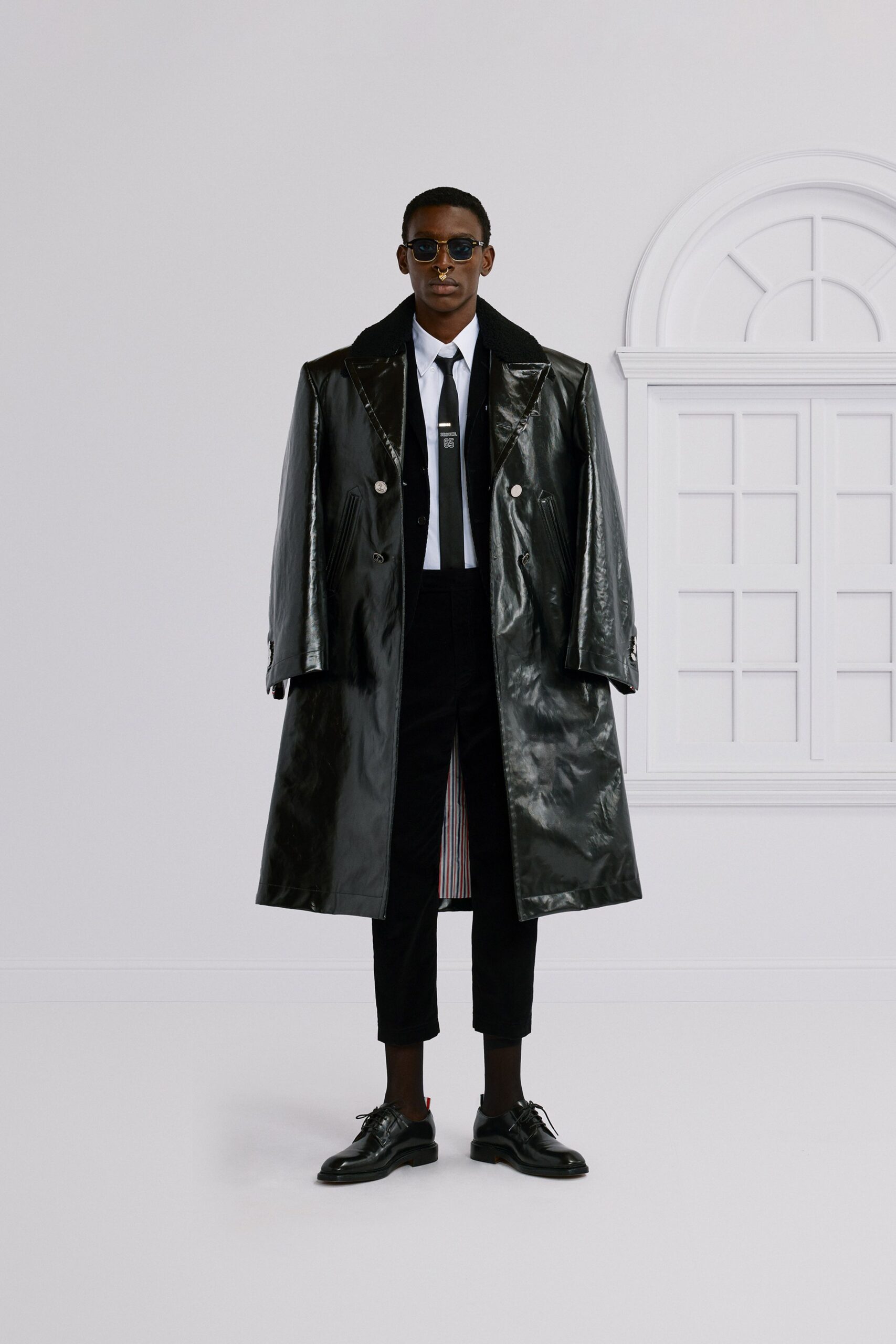 black vinyl coat with shirt and pants