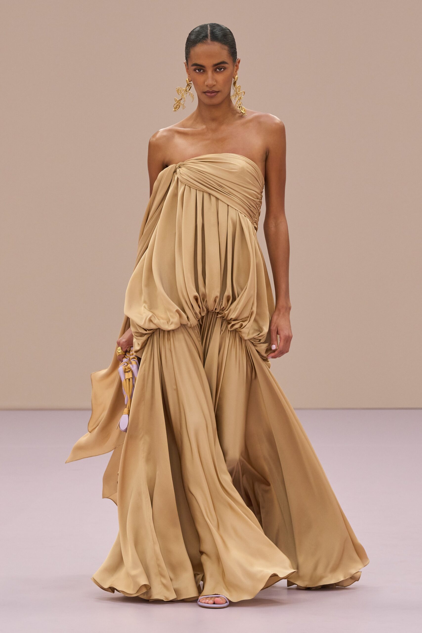 beige silk strapless fitted draped flowing maxi gown